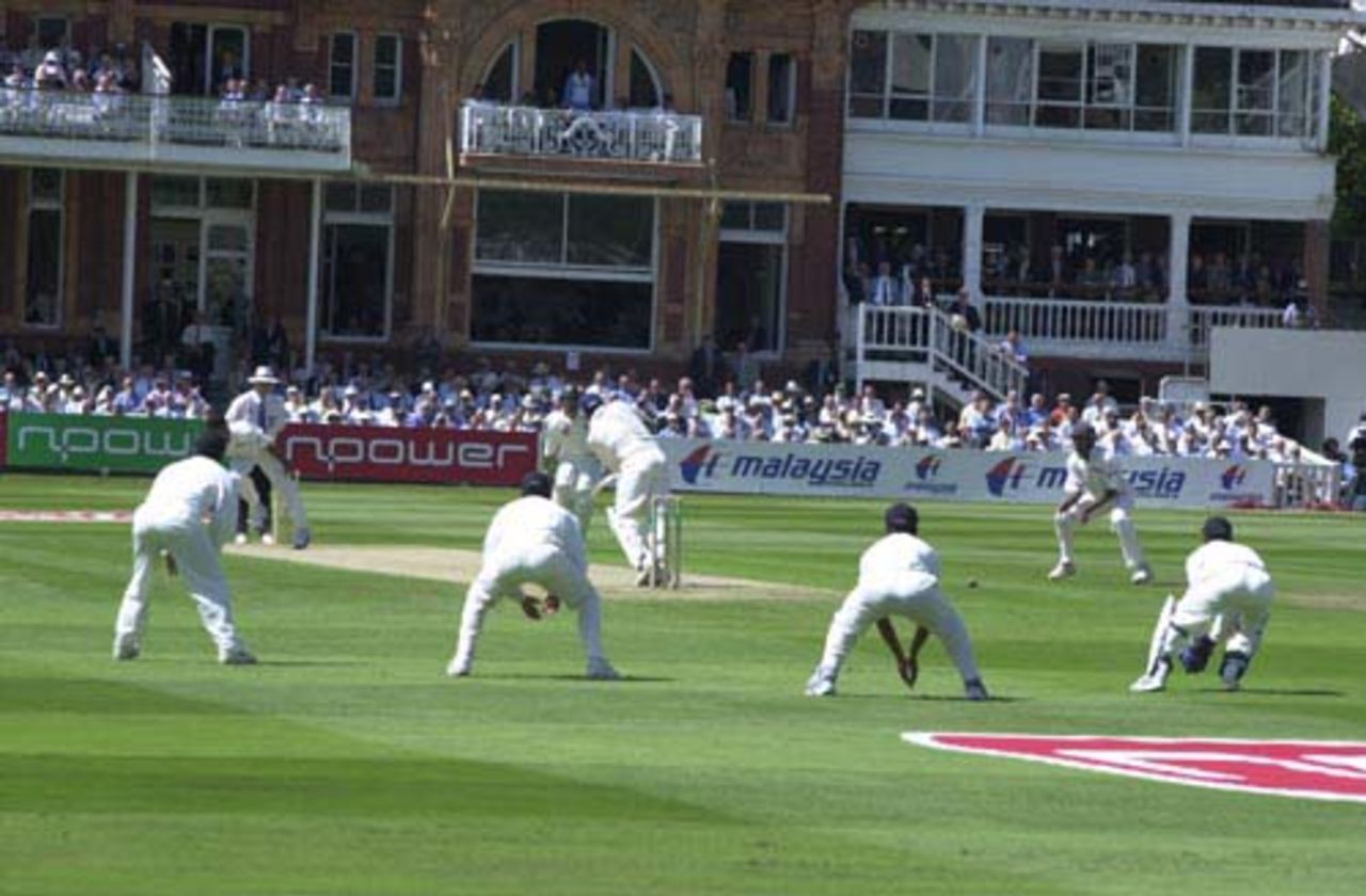 Lord's bathed in sunlight as Mark Butcher plays a Zaheer Khan delivery off his hips