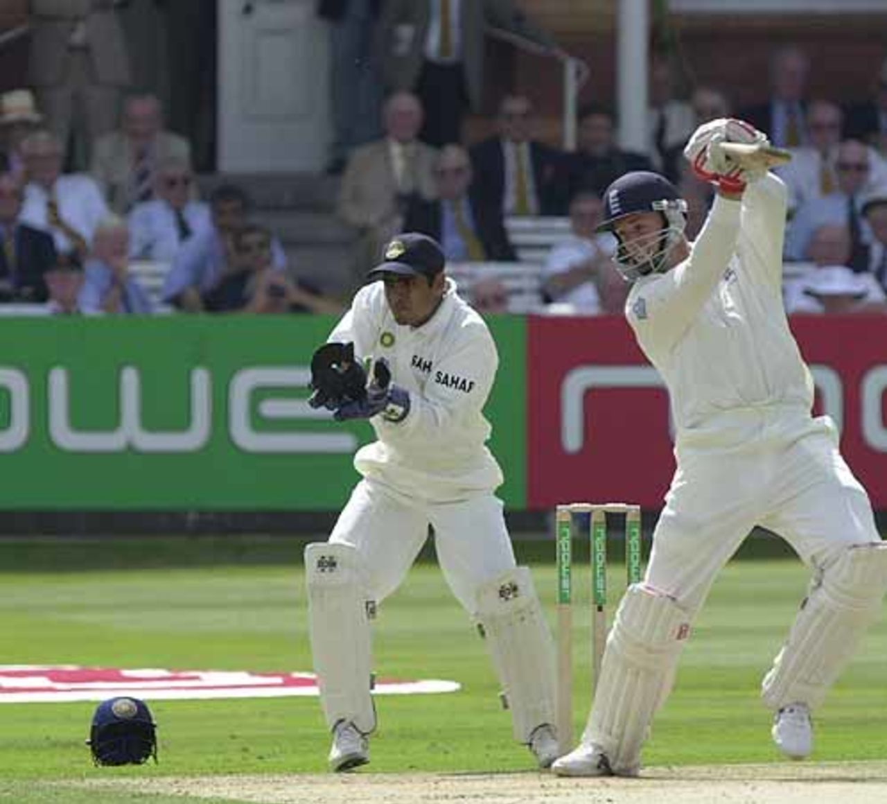 John Crawley with a lovely cover drive as Ratra can only watch, England v India, 1st npower Test at Lord's