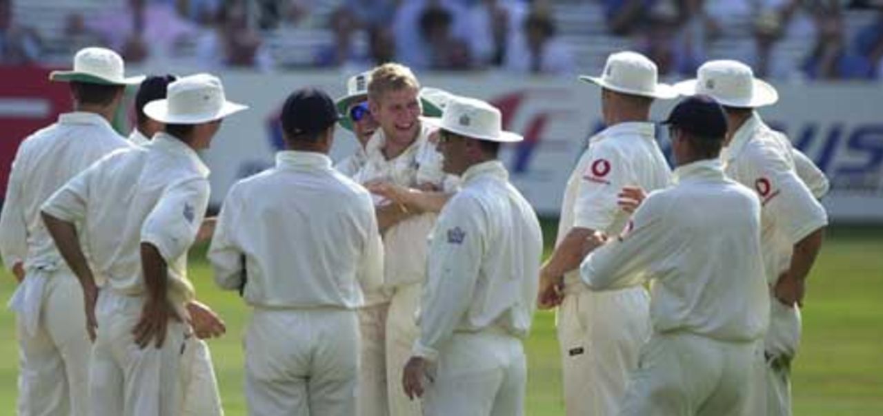 Hoggard is embraced and congratulated by fellow team mates after Ganguly is out for a duck, England v India 1st npower Test at Lord's
