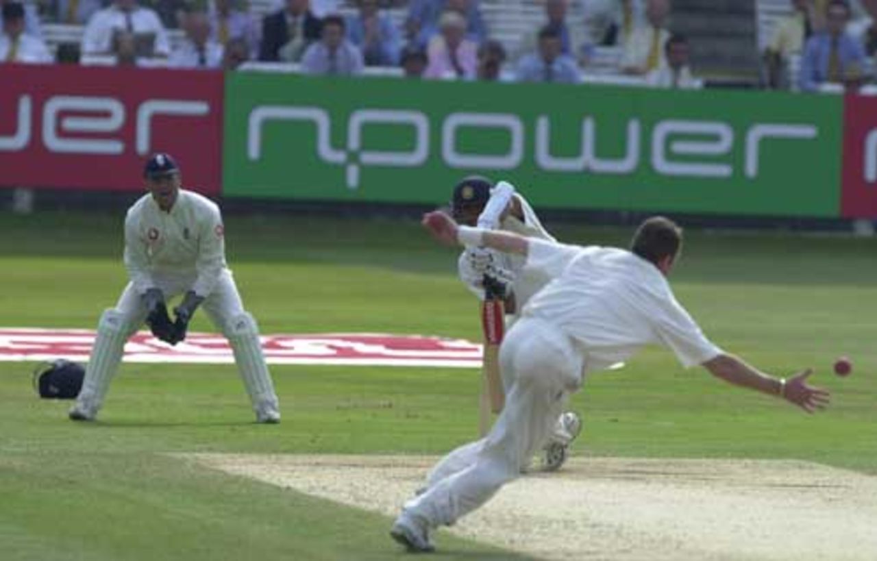 Craig White gets his finger to a return ball from Dravid, England v India 1st npower Test at Lord's