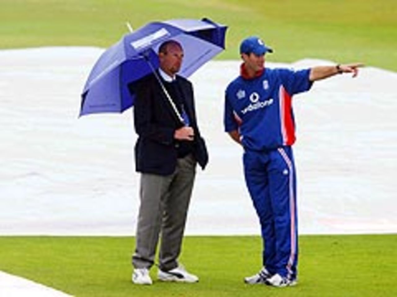 The covers are off: Michael Vaughan points the way as the fourth NatWest Series match gets underway