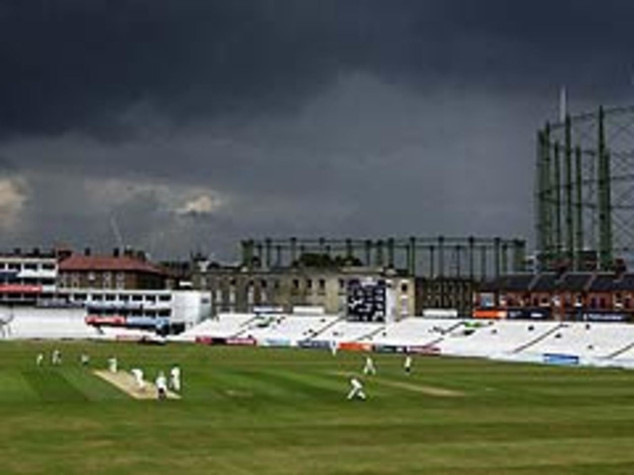 Storm clouds gather over The Oval during Surrey's match with Kent, July 2, 2003