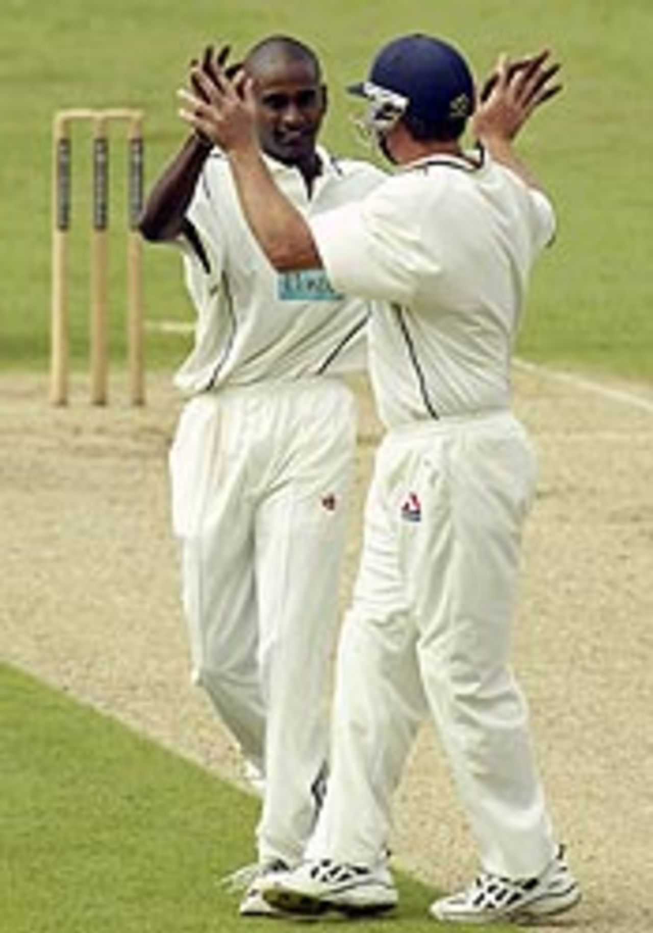 Dimitri Mascarenhas celebrates one of his six wickets v Northants