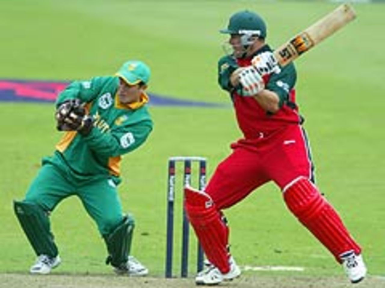 Heath Streak cuts for four on his way to 54, Zimbabwe v South Africa, Cardiff, July 5, 2003