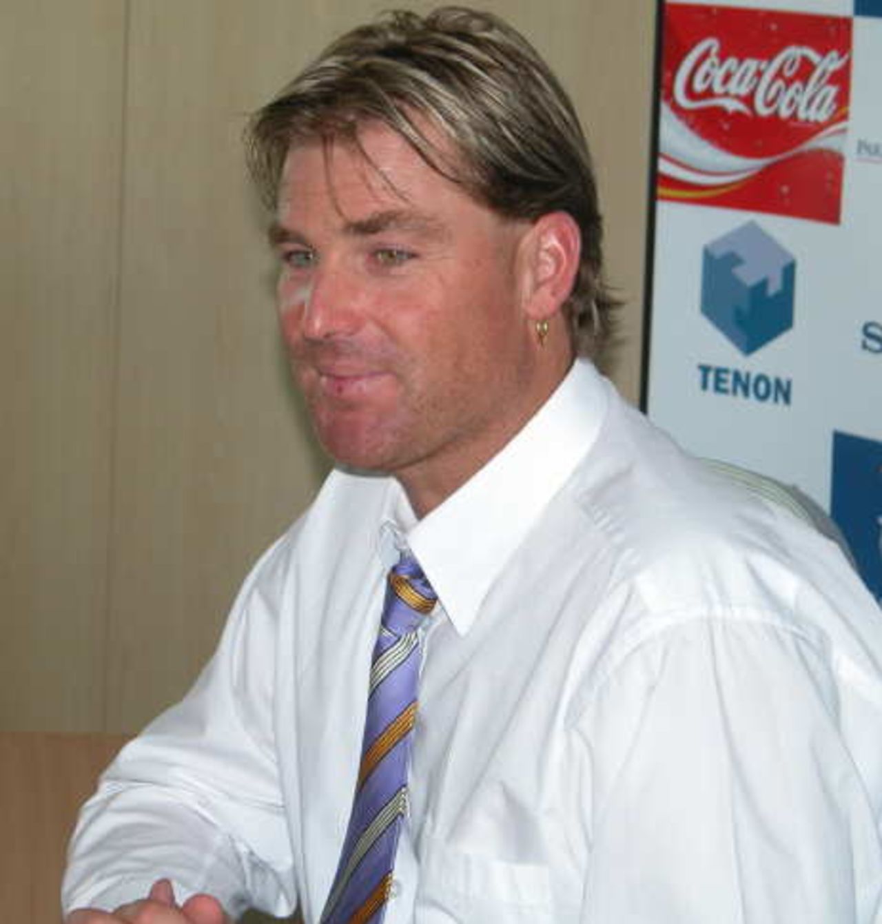 A pensive look at Shane Warne discusses his future with the Hampshire press