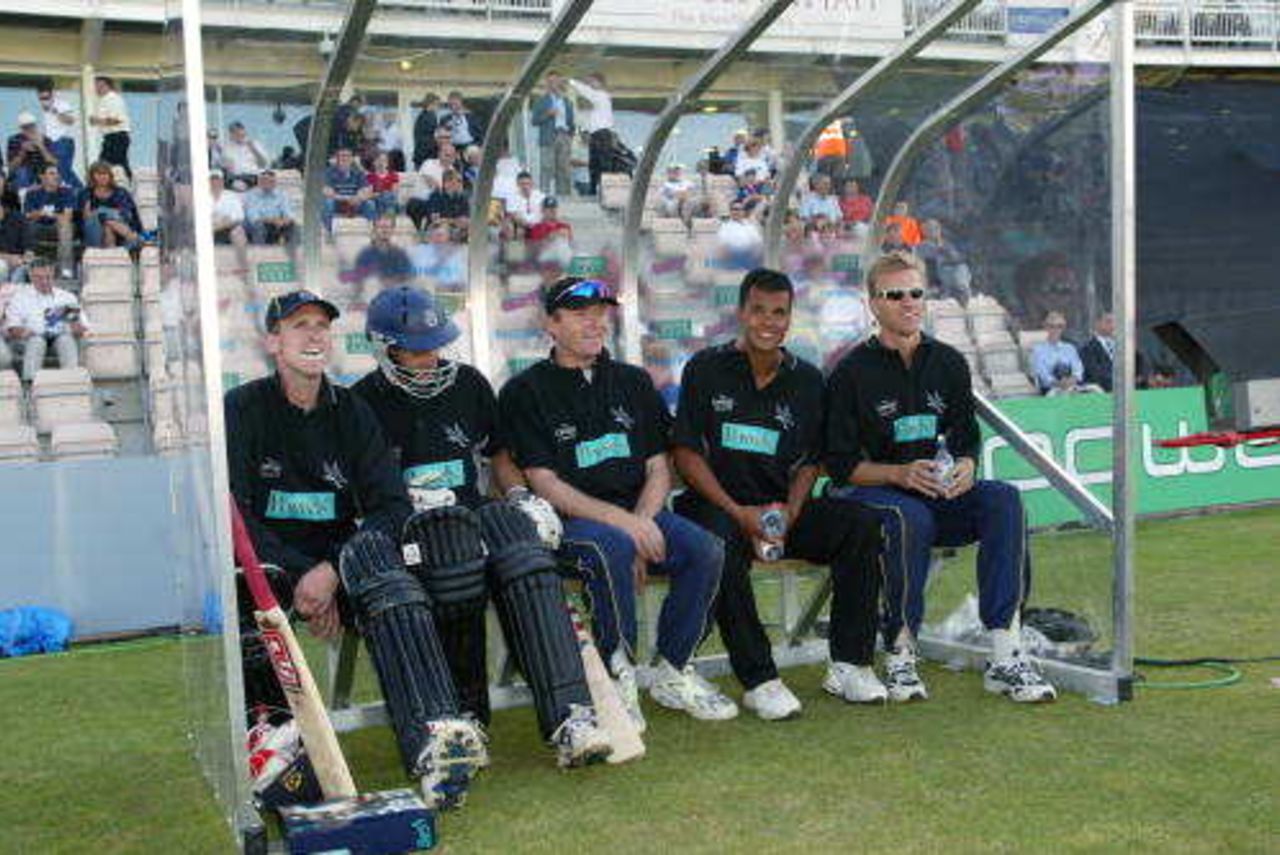 Hampshire boys in dug-out - left to right John Crawley, Simon Katich, Shaun Udal, Lawrence Prittipaul and Alan Mullally