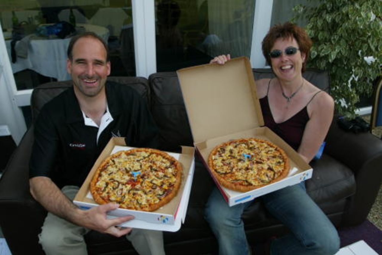 Winners enjoy their pizza