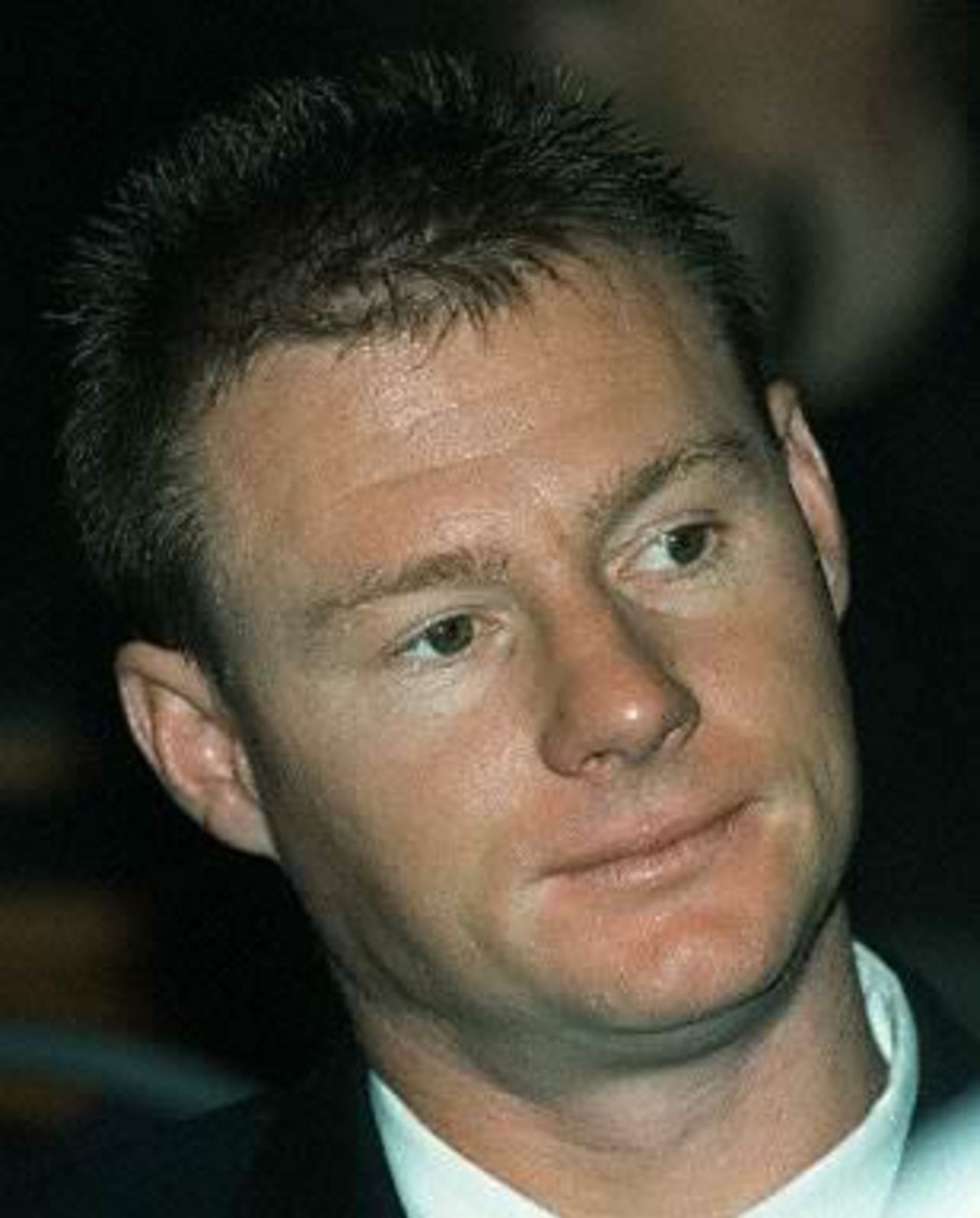 Cricketer Lance Klusener waits to testify before the King Commission of Inquiry into cricket match-fixing allegations being held in Cape Town 12 June 2000.