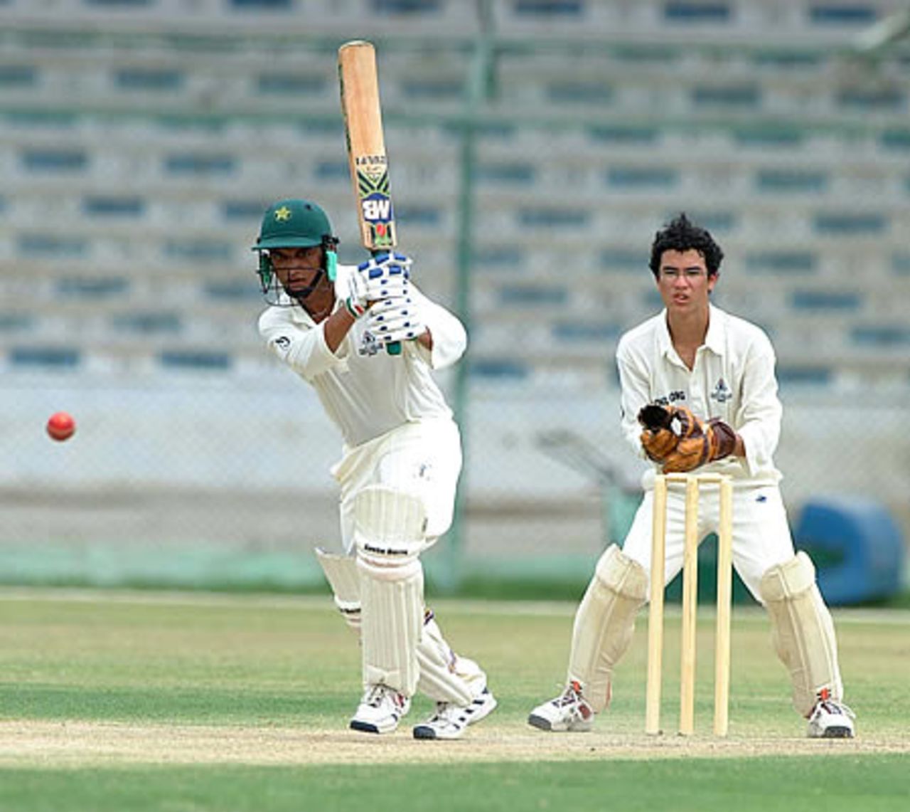 Adnan Ilyas unleashes an ondrive on his way to 168 not out, Hong Kong Under-19s v Oman Under-19s at National Stadium Karachi, Youth Asia Cup 2003, 15 July 2003.