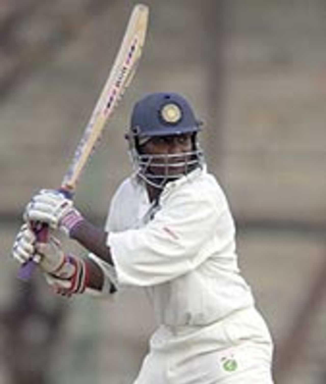 Sridharam Sriram cuts on his way to a century for the Board President's XI against England at Hyderabad