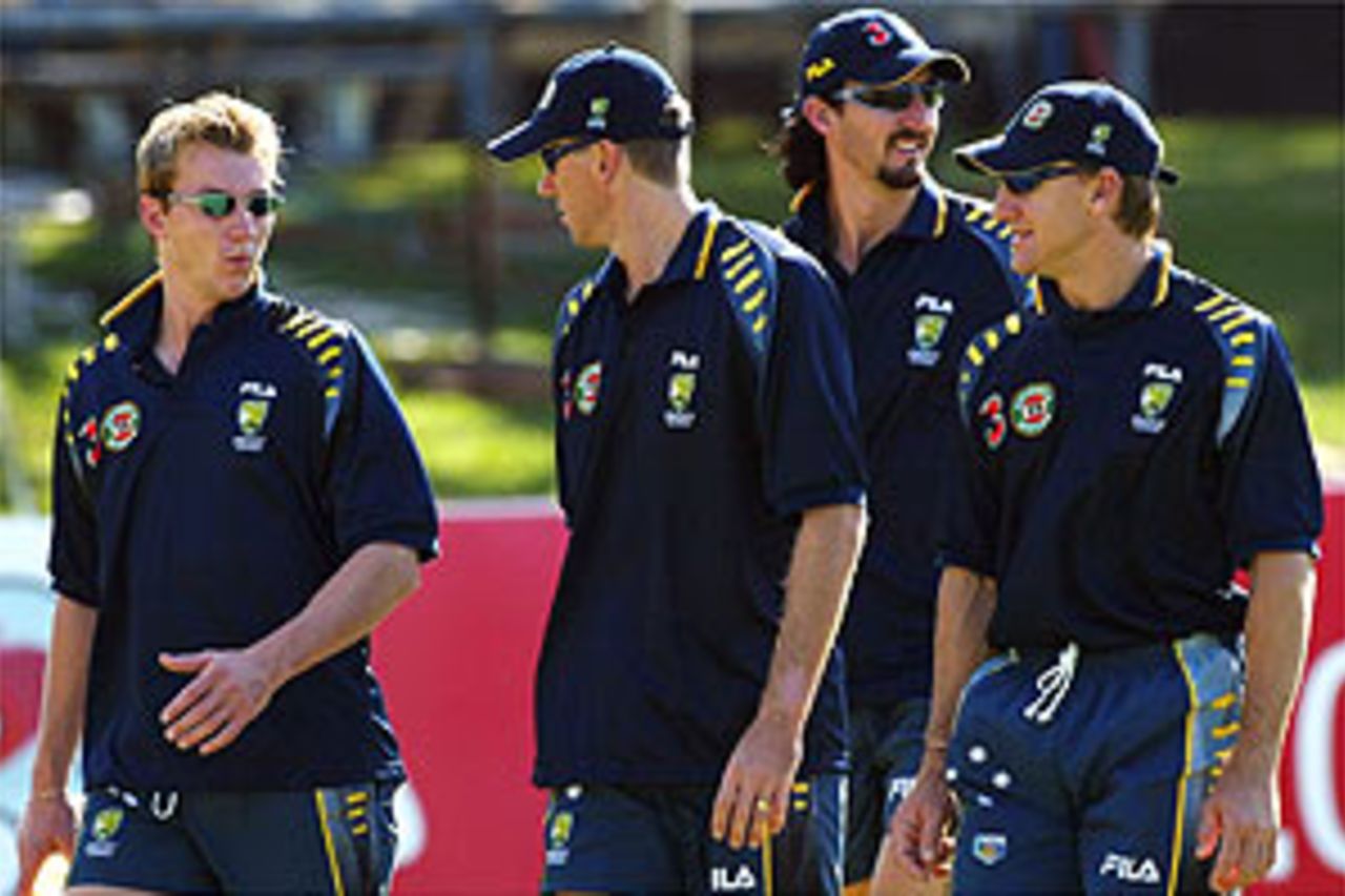 DARWIN - JULY 17: Brett Lee, Glenn McGrath, Jason Gillespie and Andy Bichel of Australia take a walk during training on July 17, 2003 at Marrara Oval in Darwin, Australia.