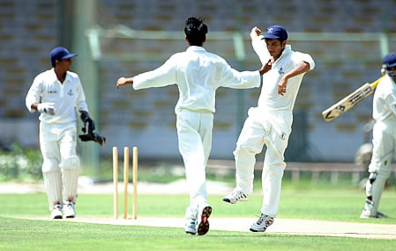 Oman's Imran Younus and team-mates celebrate after Deepak Saraff is bowled, Oman Under-19s v Thailand Under-19s at National Stadium Karachi, Youth Asia Cup 2003, 19 July 2003.