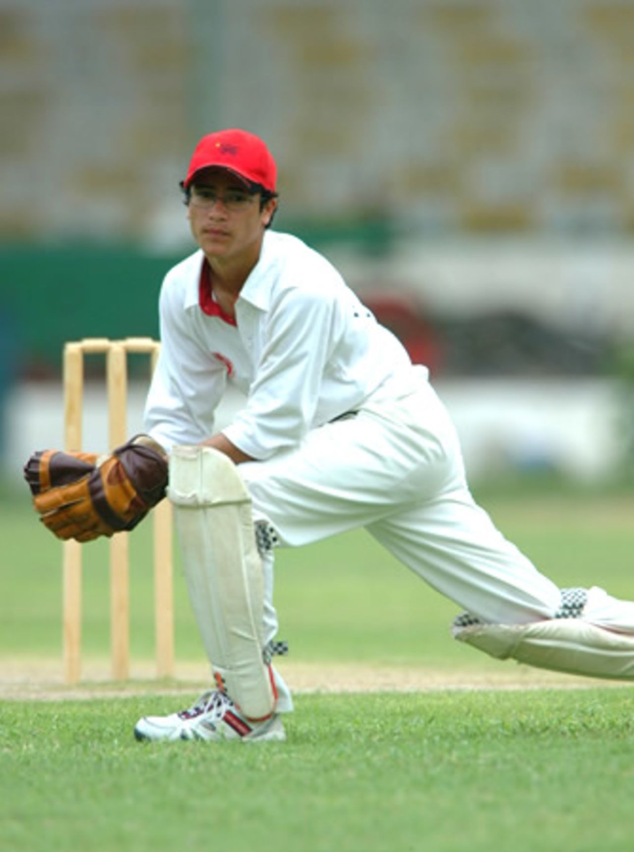 Matthew Lind Hong Kong wicketkeeper saves runs, Hong Kong Under-19s v Thailand Under-19s at National Stadium Karachi, Youth Asia Cup 2003, 21 July 2003.