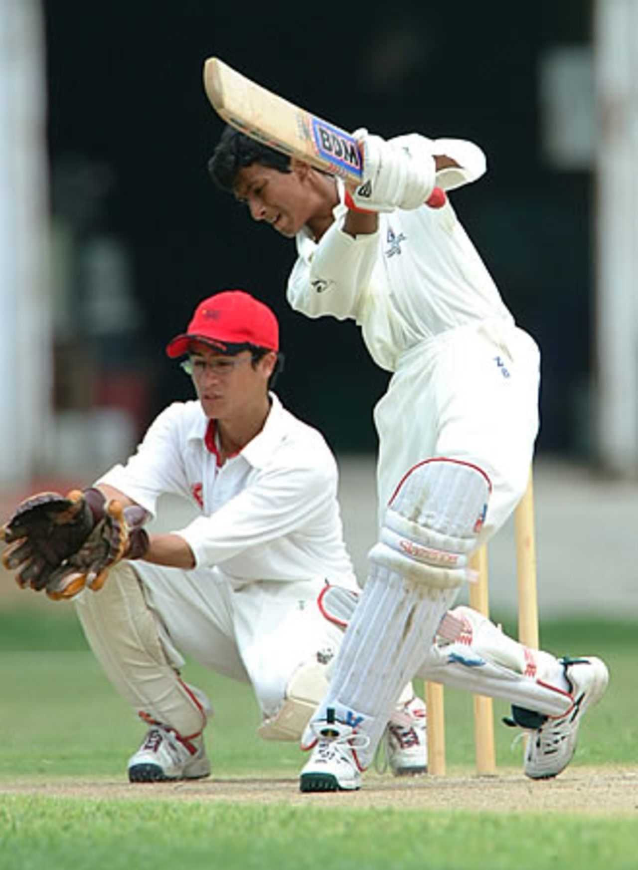 Darshil Upendra with a fine off-drive, Hong Kong Under-19s v Thailand Under-19s at National Stadium Karachi, Youth Asia Cup 2003, 21 July 2003.