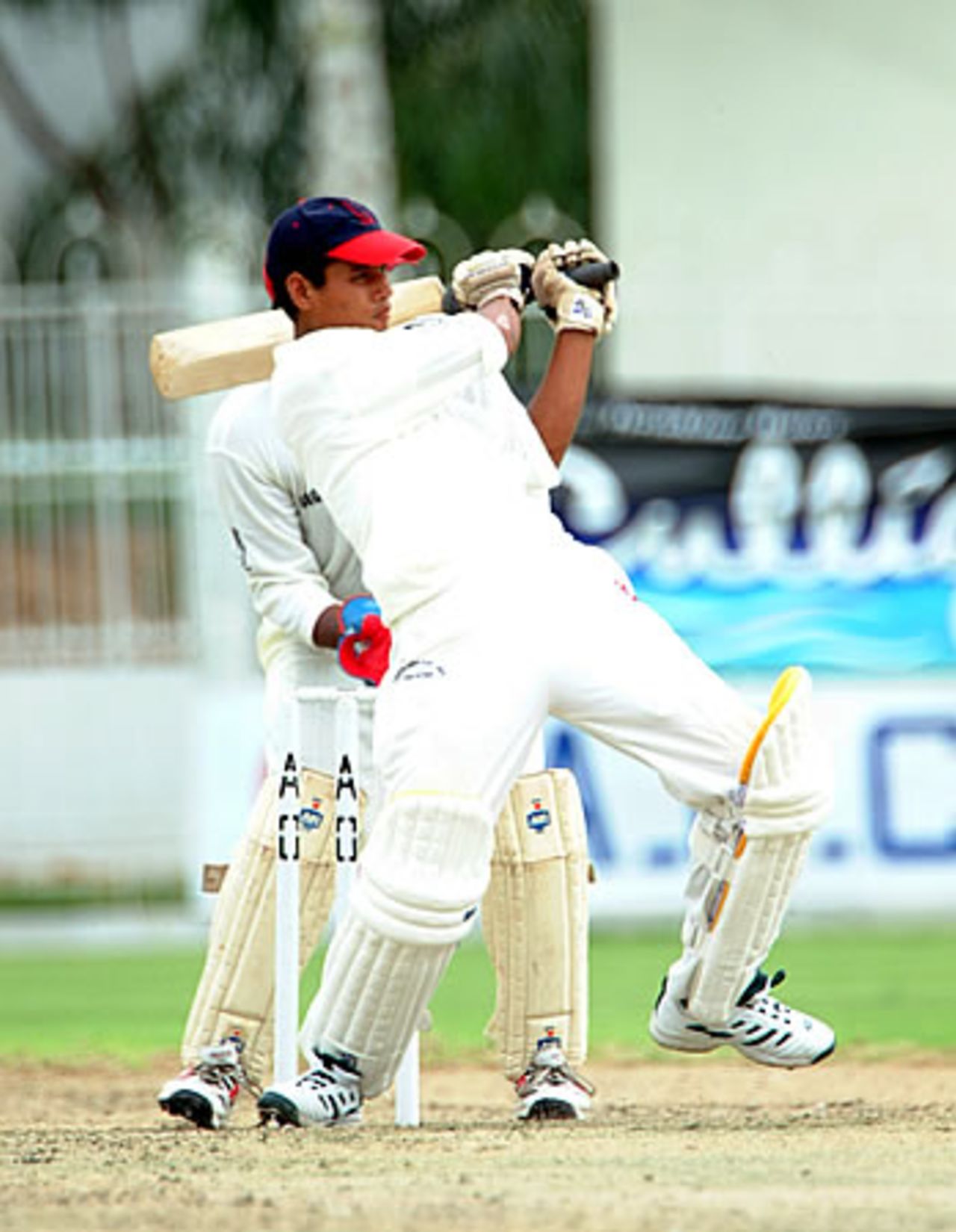 Prem Chaudhary of Nepal pulls on his way to 25, Nepal Under-19s v Singapore Under-19s at Asghar Ali Shah Stadium Karachi, Youth Asia Cup 2003, 22 July 2003.