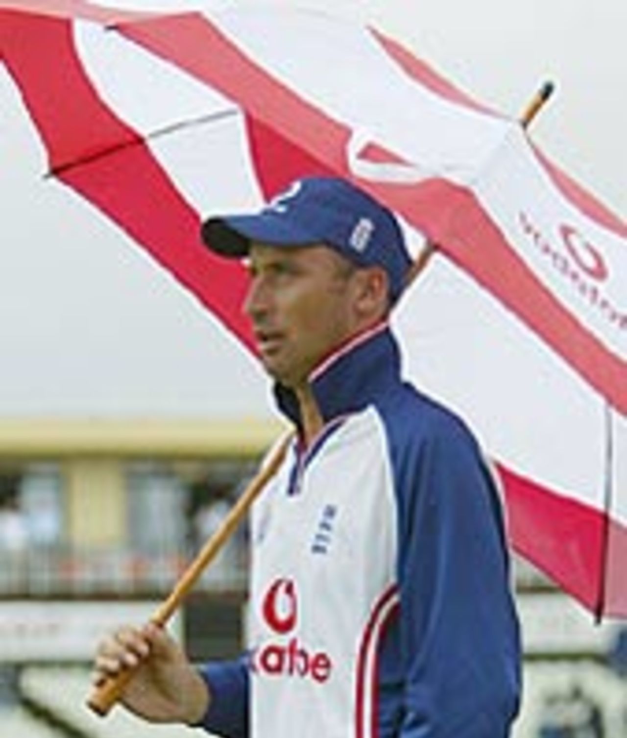 Nasser Hussain inspects the pitch after heavy rain during the first Test against South Africa at Edgbaston