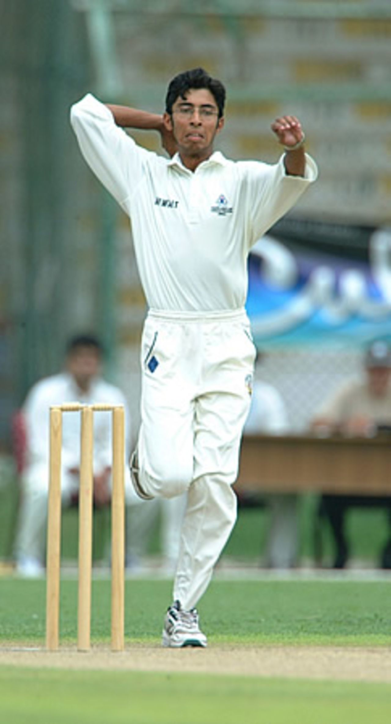 Waqas Jamil of Kuwait during his 3-wicket spell, 1st Semi Final: Kuwait Under-19s v Nepal Under-19s at National Stadium, Karachi, Youth Asia Cup 2003, 26 July 2003.