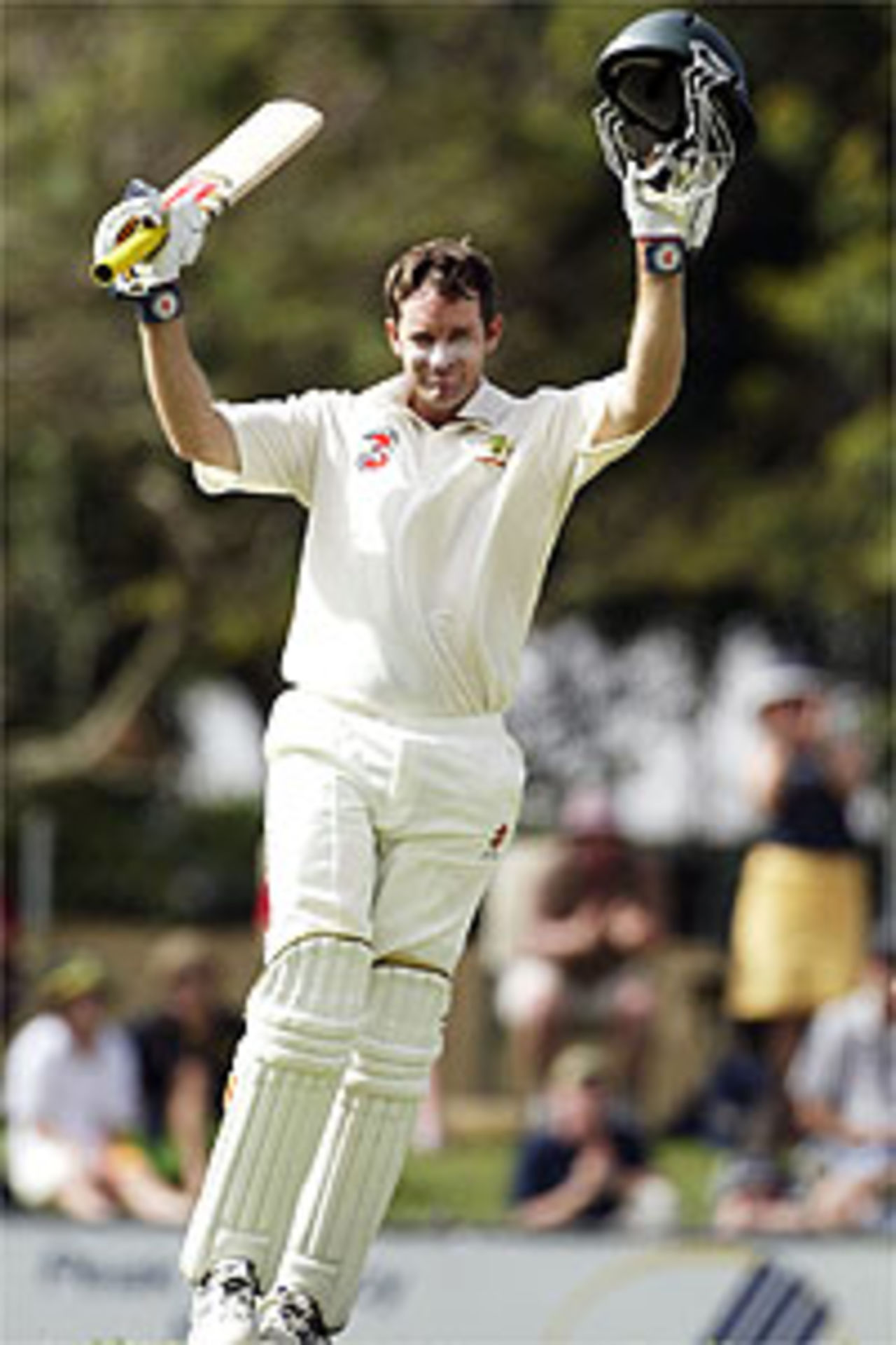 CAIRNS, AUSTRALIA - JULY 27: Martin Love of Australia reaches 100 during day three of The Second Test between Australia and Bangladesh played on July 27, 2003 at The Bundaberg Rum Stadium in Cairns, Australia.