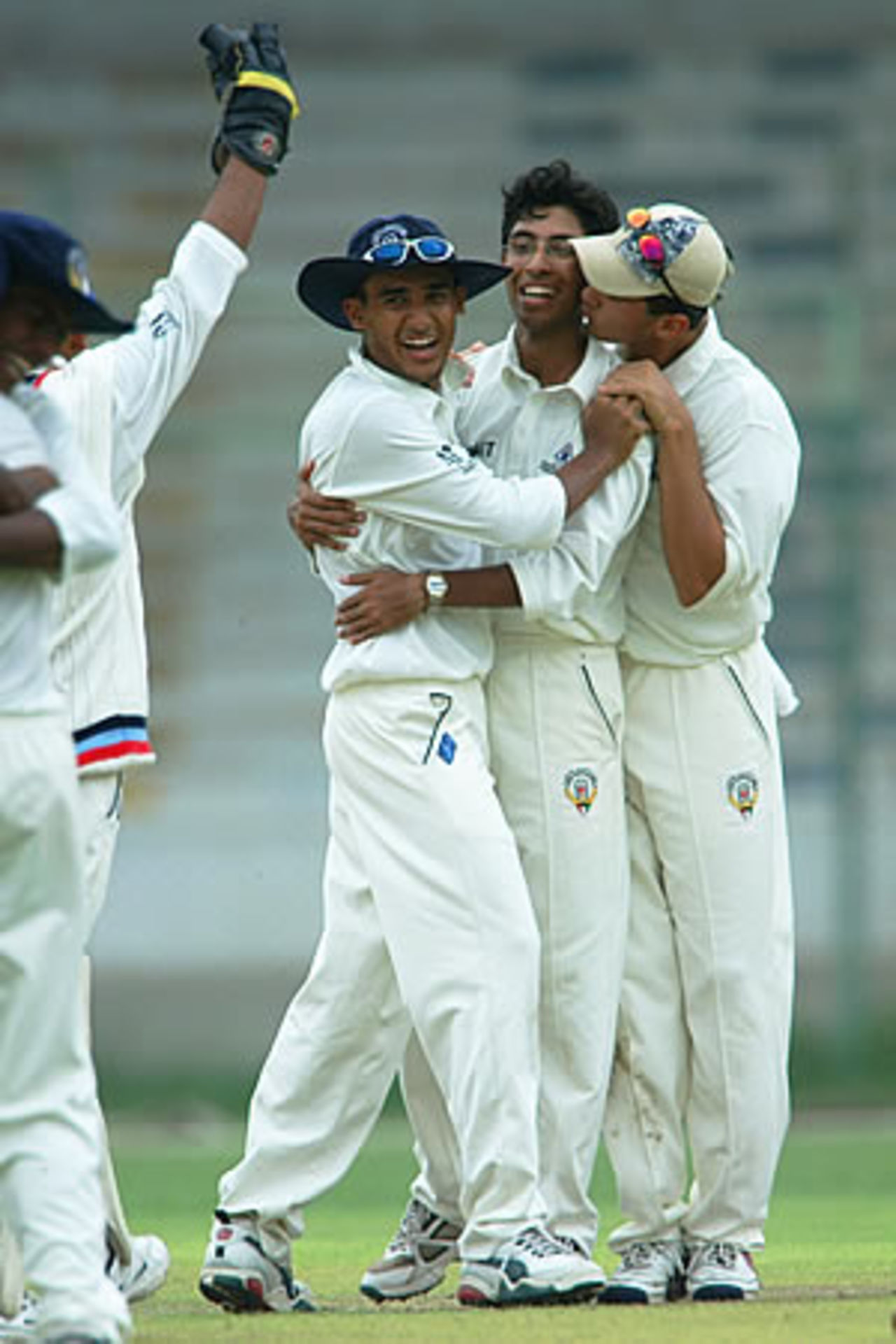 Waqas Jamil and Kuwait players celebrate a wicket, 1st Semi Final: Kuwait Under-19s v Nepal Under-19s at National Stadium, Karachi, Youth Asia Cup 2003, 26 July 2003.