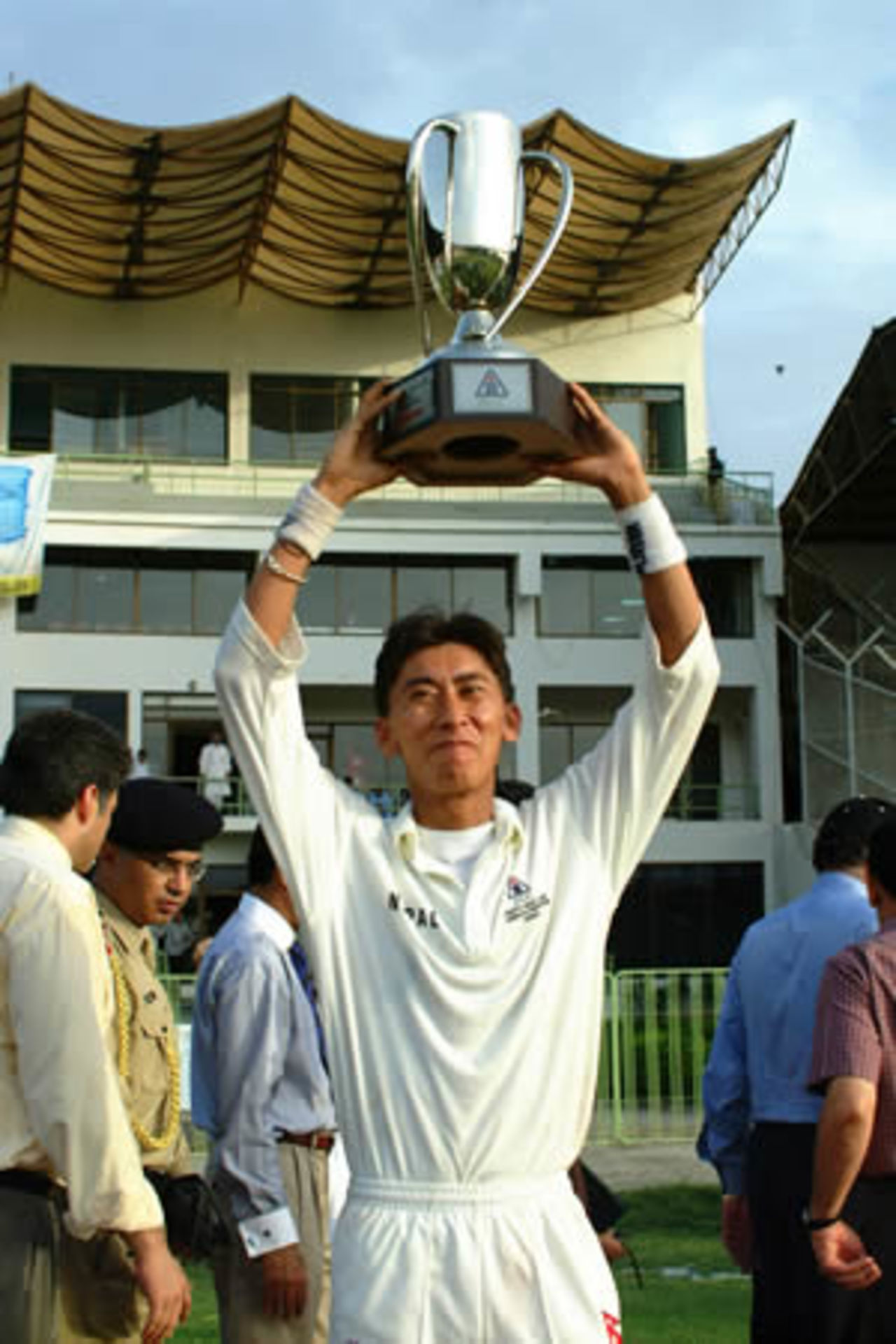 Nepal skipper Shakti Prasad holds up the trophy, Final: Malaysia Under-19s v Nepal Under-19s at National Stadium, Karachi, Youth Asia Cup 2003, 27 July 2003.