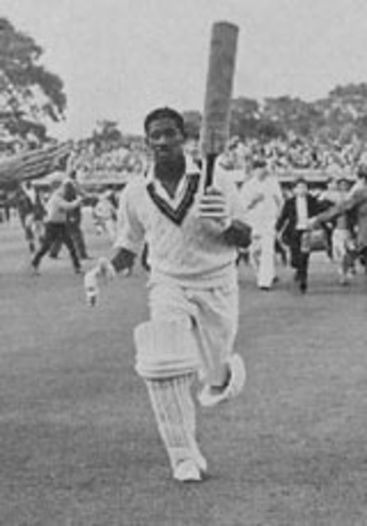 Basil Butcher leaves the field after scoring an unbeaten 129 on the third day of the 2nd Test between England and West Indies, June 22, 1963. He added only four more to his score when play resumed