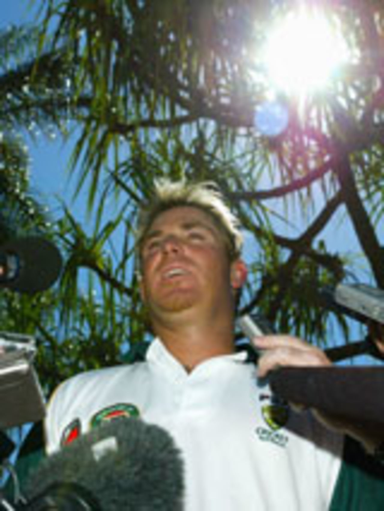 Shane Warne talks to the media, Cairns, July 6, 2004