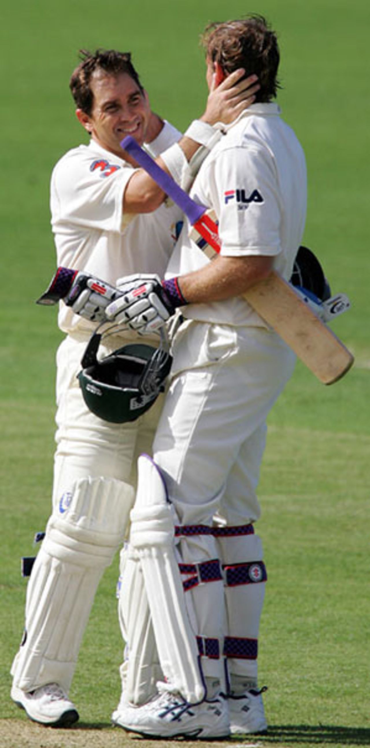 Matthew Hayden is congratulated by Justin Langer on reaching his hundred, Australia v Sri Lanka, 2nd Test, Cairns, 1st day, July 9, 2004