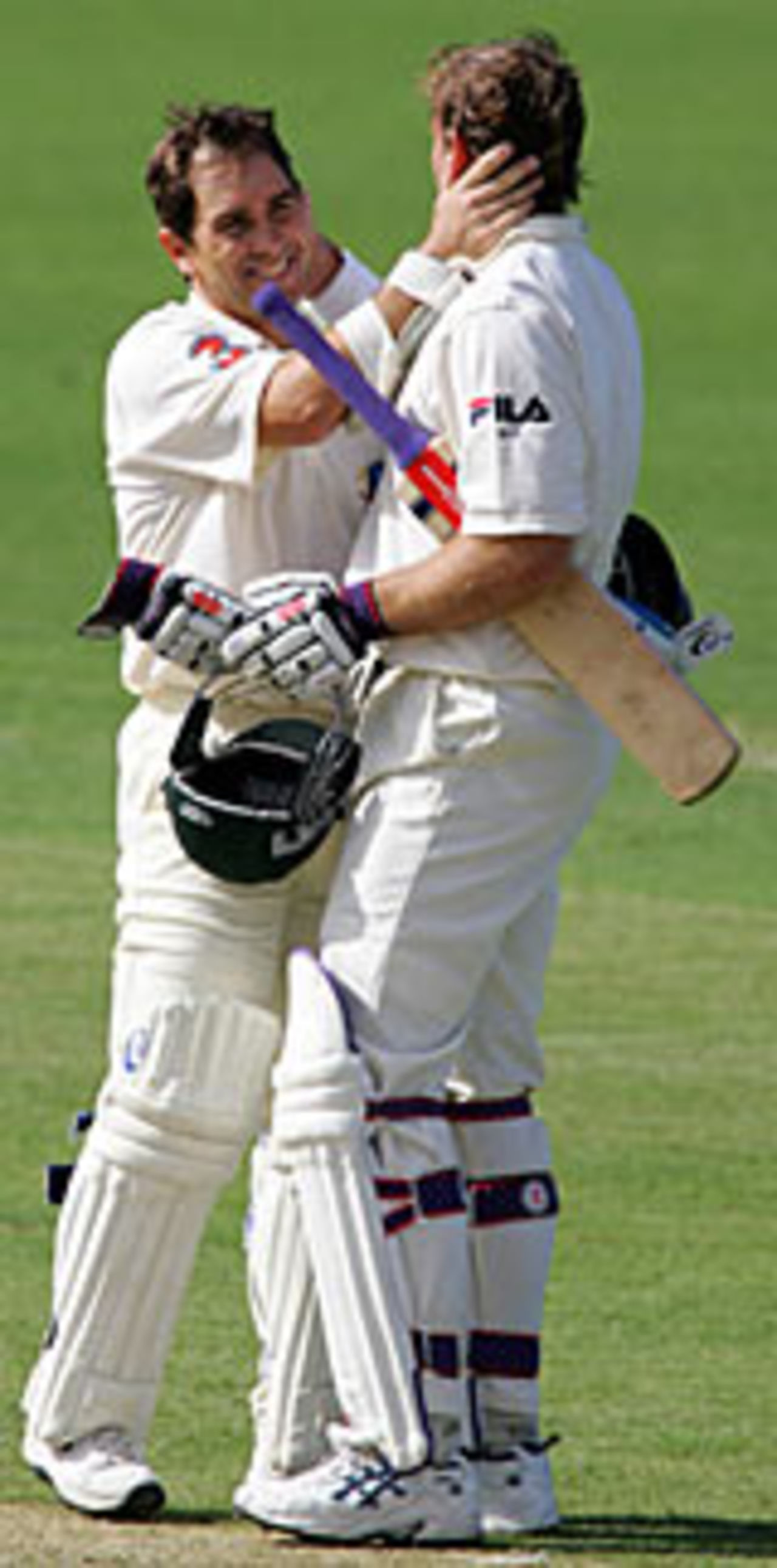 Matthew Hayden is congratulated by Justin Langer on reaching his hundred, Australia v Sri Lanka, 2nd Test, Cairns, 1st day, July 9, 2004
