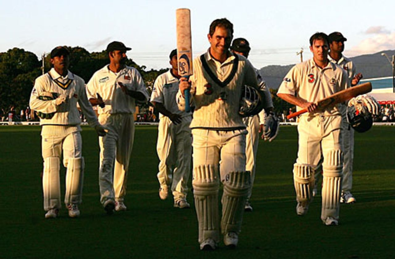 Justin Langer leads Australia off, unbeaten on 159, Australia v Sri Lanka, 2nd Test, Cairns, 1st day, July 9, 2004