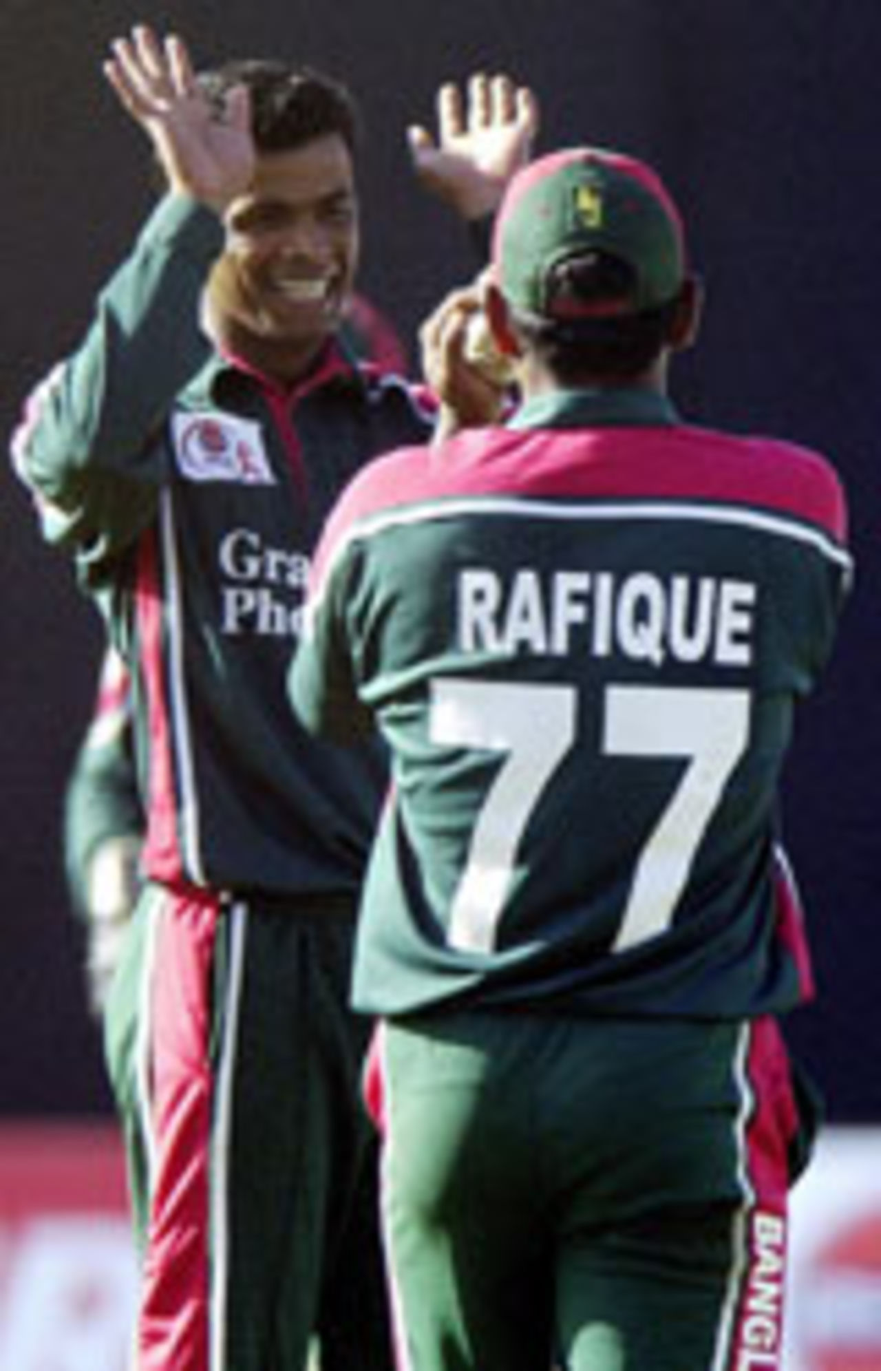 Abdur Razzaq and Mohammad Rafique celebrate the wicket of a Hong Kong batsman, Bangladesh v Hong Kong, Asia Cup, July 16 2004