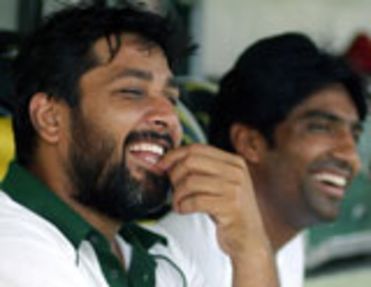 Inzamam-ul-Haq shares a joke with Yousuf Youhana during a practice session before the Asia Cup, July 16 2004