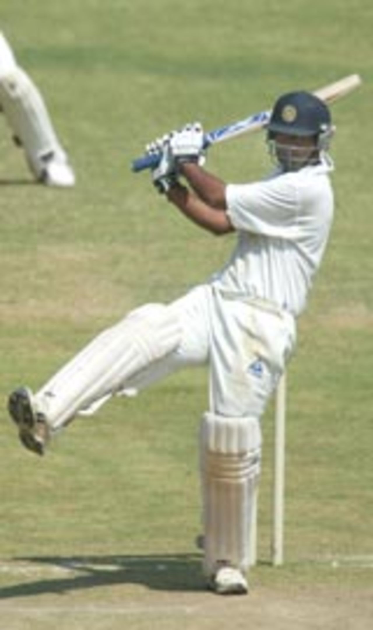 Dinesh Mongia pulls the ball to the boundary during his century against England A, February 9 2004