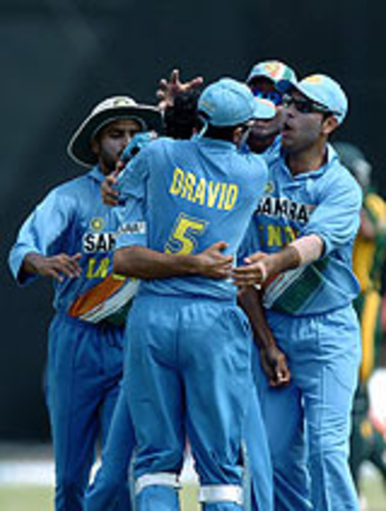 The Indians in a huddle after the fall of the first wicket, Pakistan v India, Asia Cup, 10th match, Colombo, 25 July, 2004