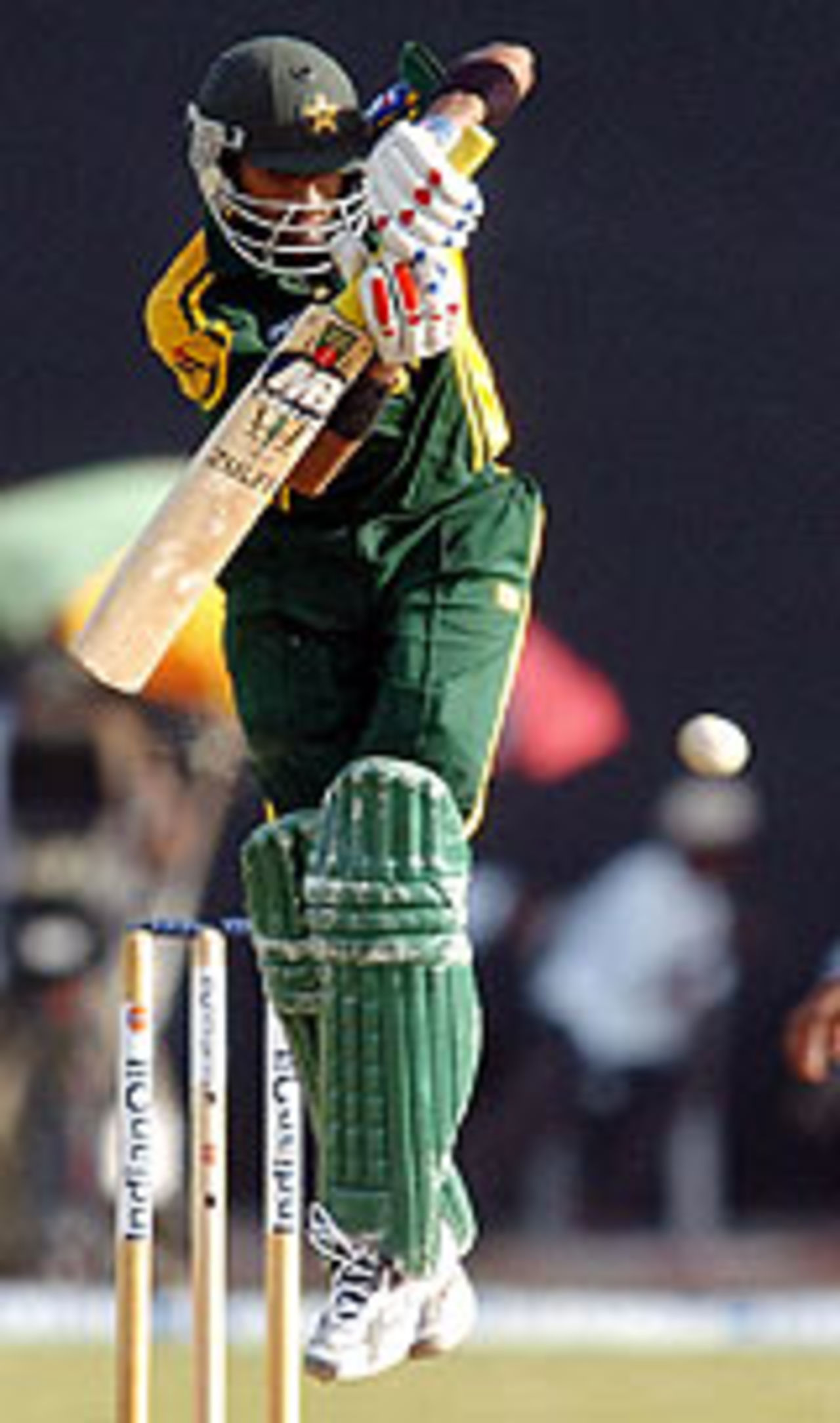 Shoaib Malik leaps up and plays the ball, Pakistan v India, Asia Cup, 10th match, Colombo, 25 July, 2004