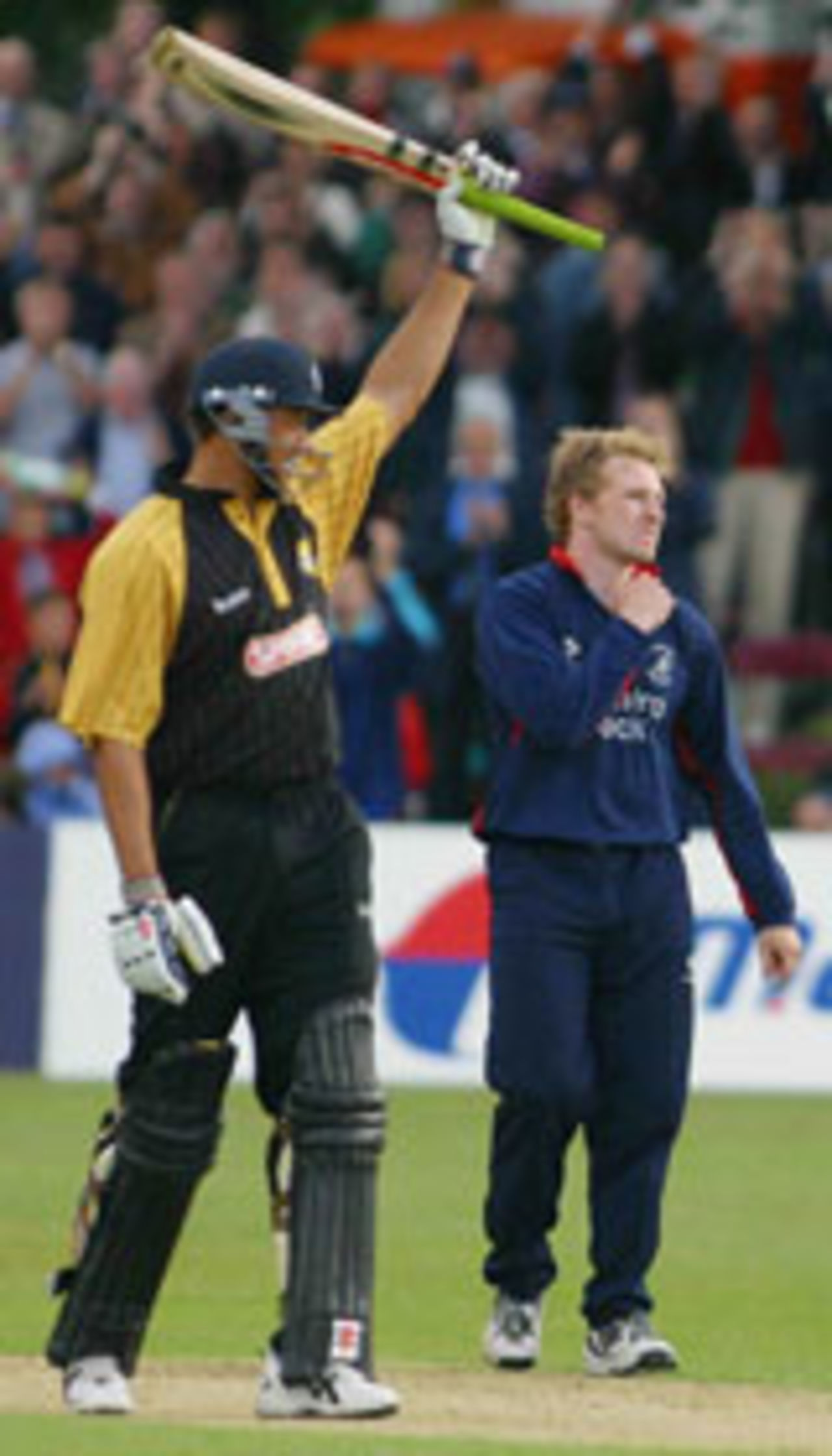 Andrew Symonds celebrates his century in a Twenty20 Cup match against Middlesex, July 2 2004