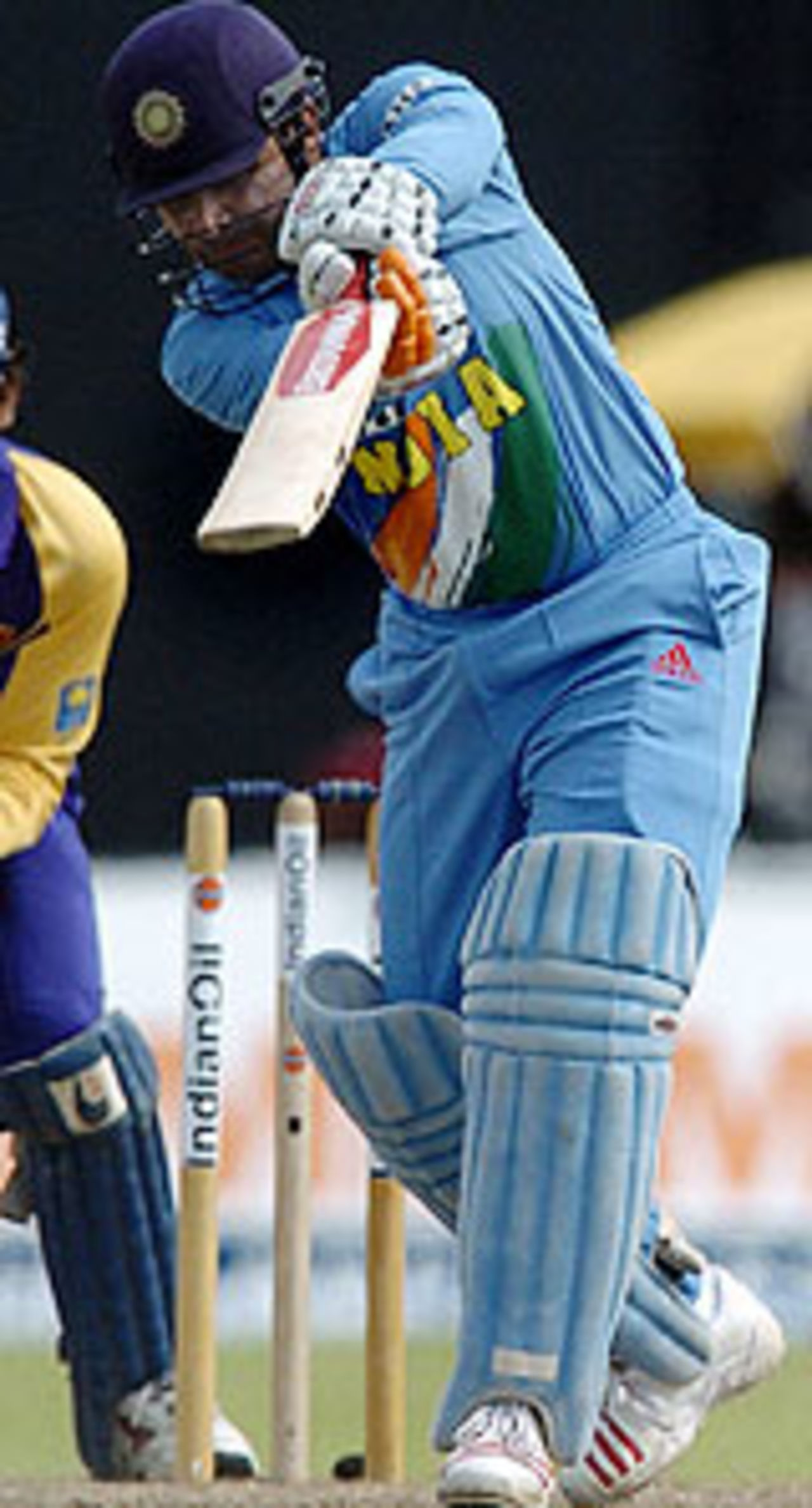 Virender Sehwag drives to the covers, Sri Lanka v India, Asia Cup, Colombo, 11th match, July 27, 2004