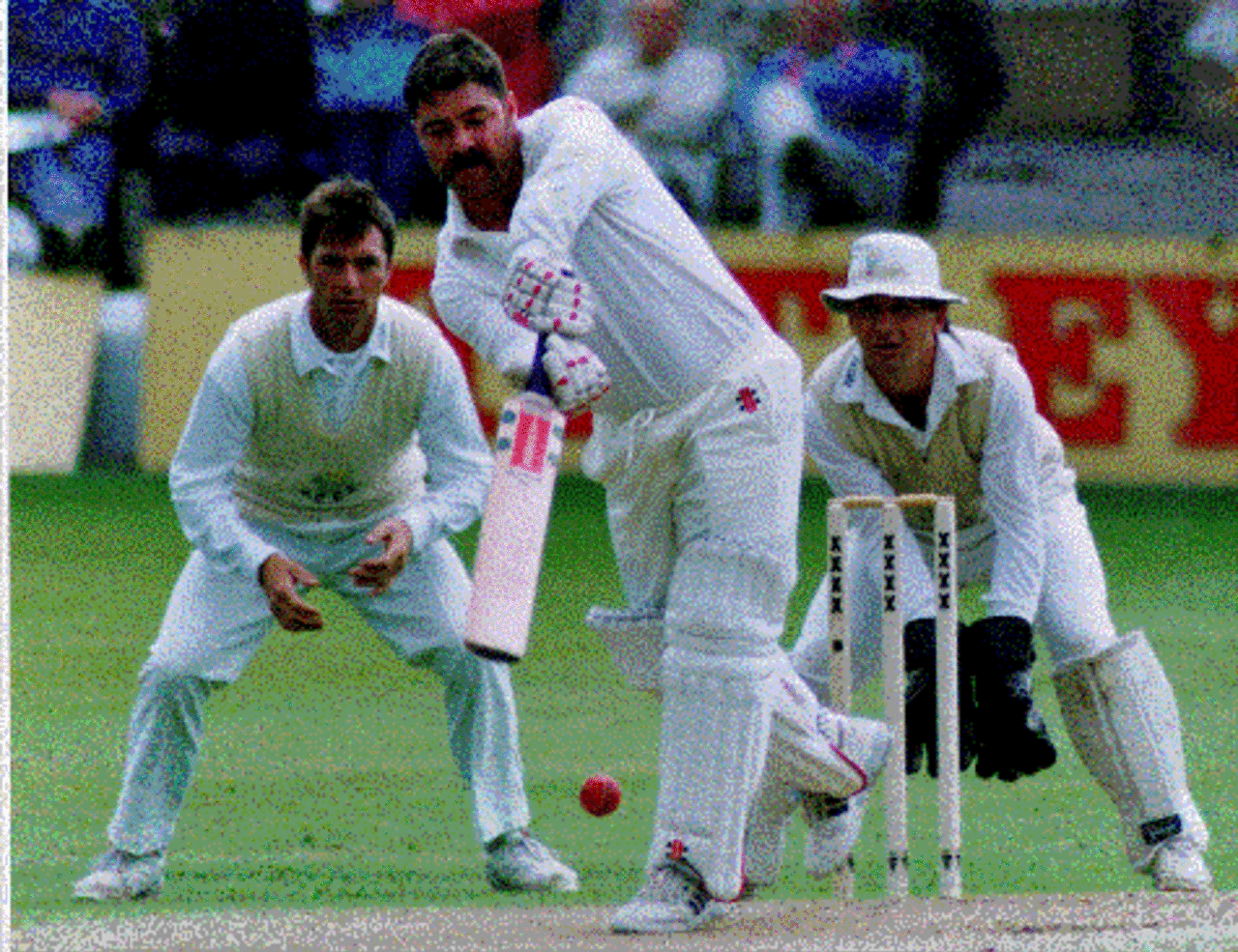 Colin Metson keeping wicket at Neath against Australia in 1993. Boon the batsman