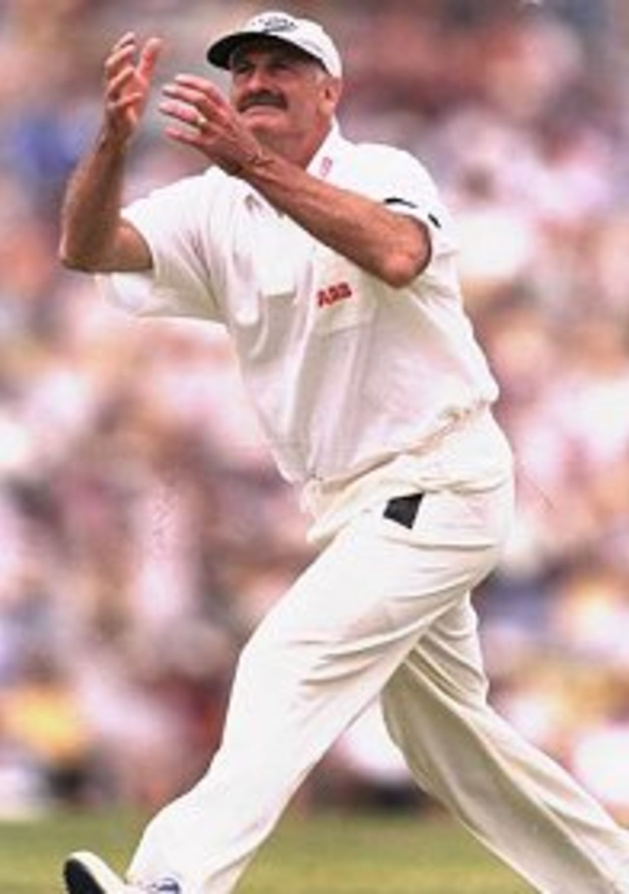 Dennis Lillee lines up a catch