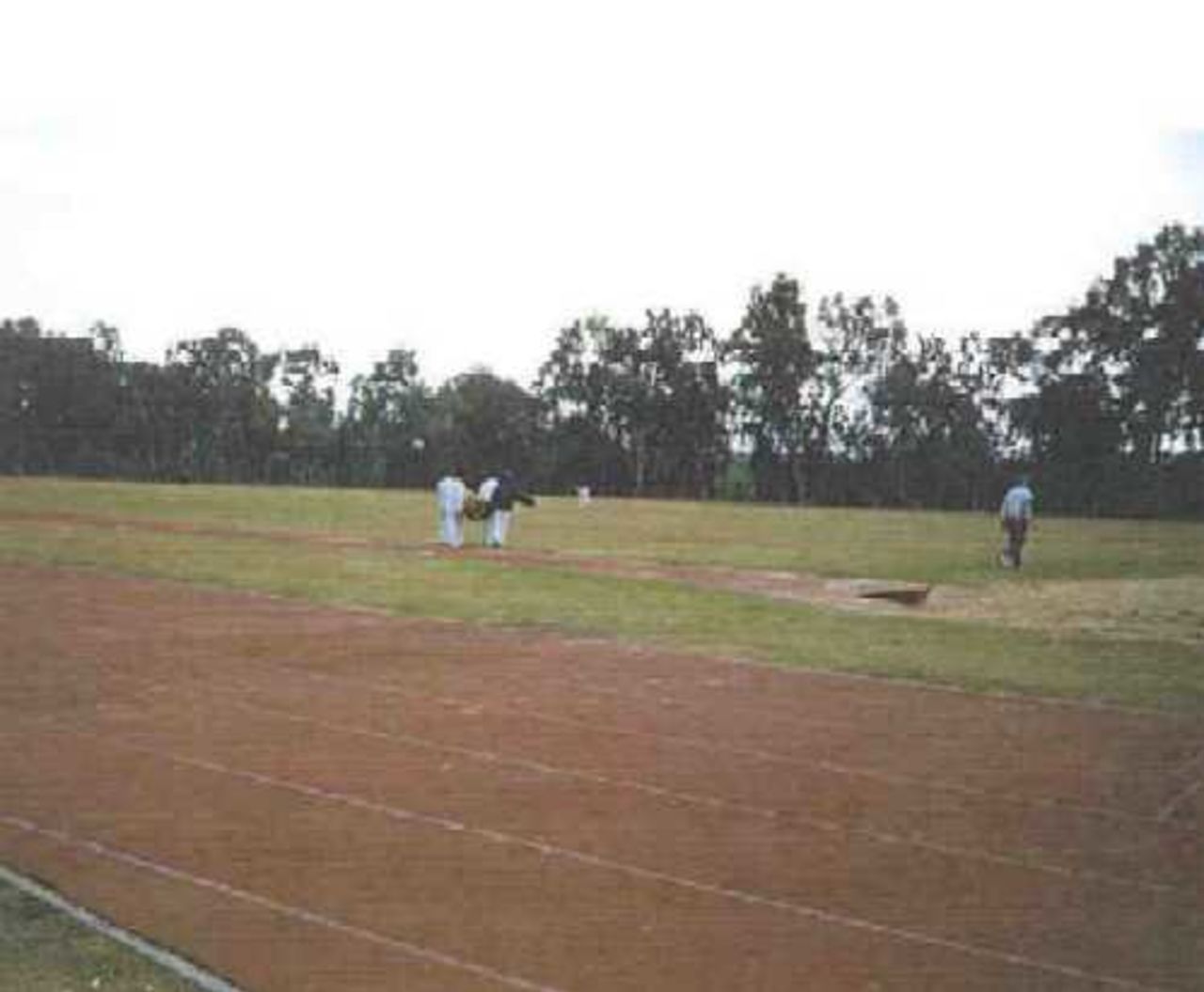 Carrying the matting pitch into place at the Tel Aviv Second Ground
