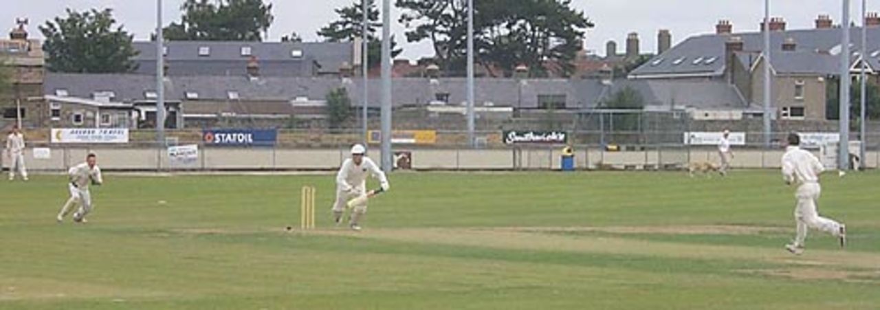Daan van Bunge (Holland) pushes McKenzie (Ireland) for a quick single.