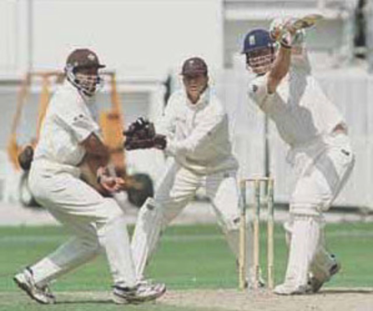 Flintoff plays the drive as Ben Hollioake takes cover, PPP healthcare County Championship Division One, 2000, Surrey v Lancashire, Kennington Oval, London, 02-05 August 2000(Day 3).