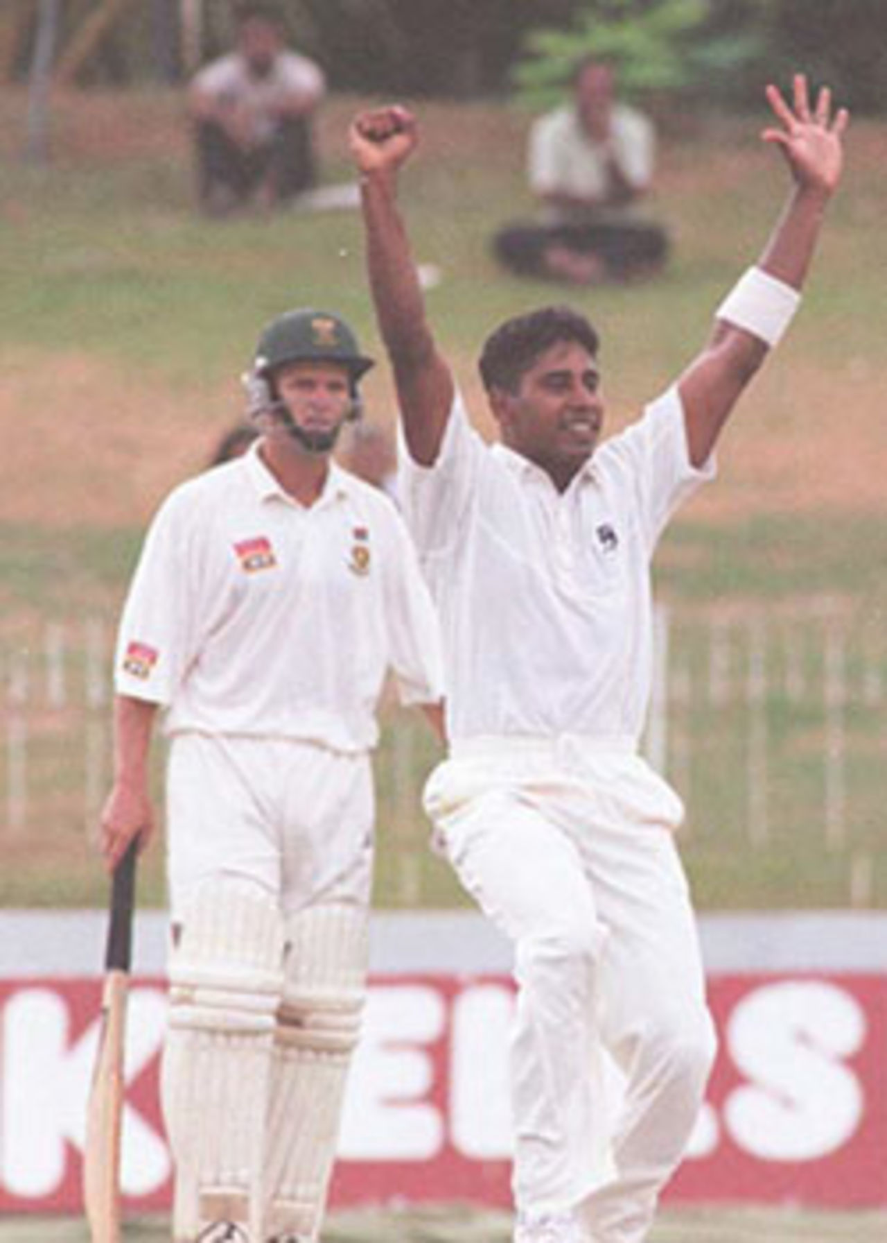 Gary Kirsten looks on as Chaminda Vaas celebrates, South Africa in Sri Lanka, 2000/01, 3rd Test, Sri Lanka v South Africa, Sinhalese Sports Club Ground, Colombo, 06-10 August 2000 (Day 1).