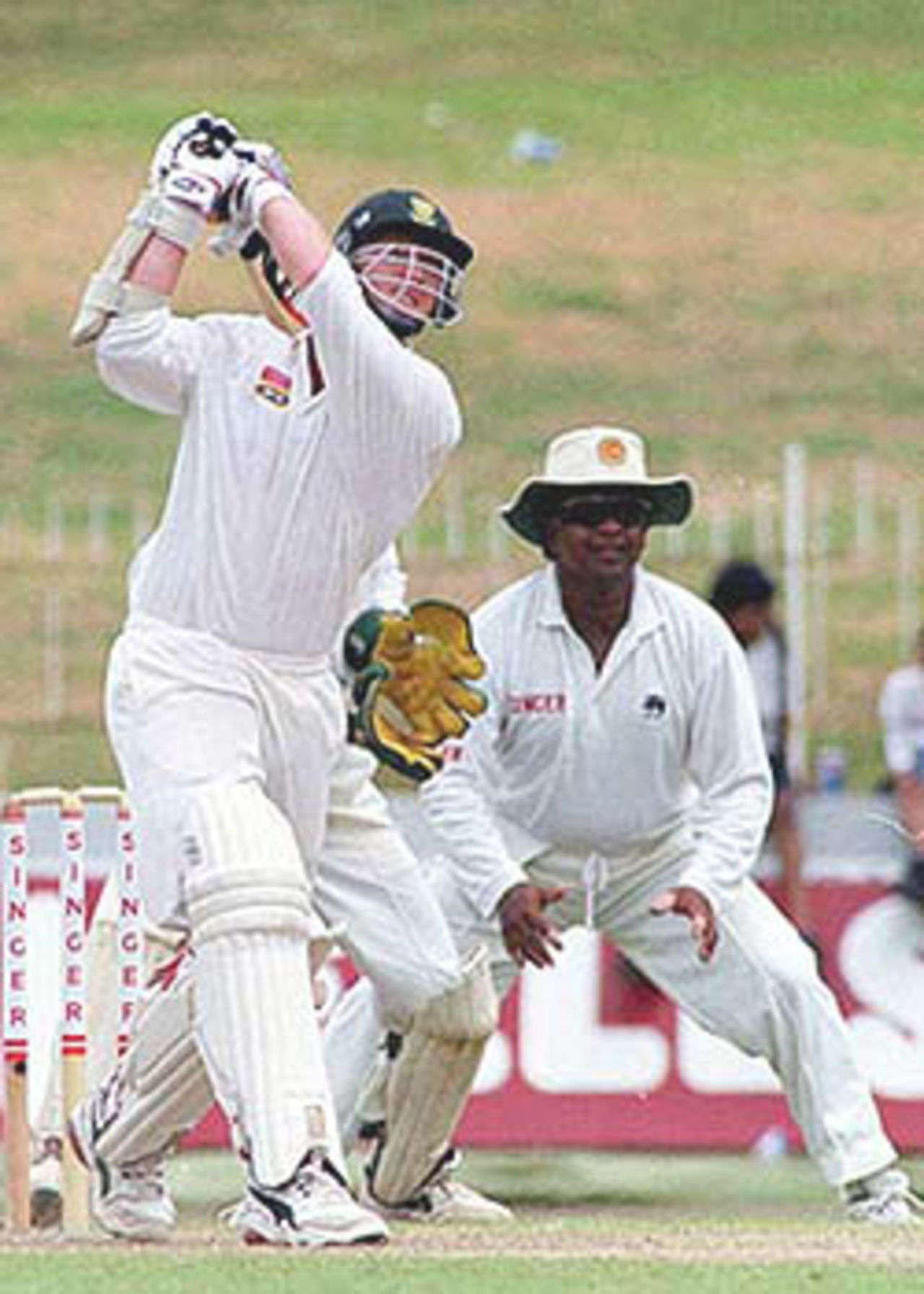 Ranatunga watches on as Klusener smashes the ball to the offside boundary, South Africa in Sri Lanka, 2000/01, 3rd Test, Sri Lanka v South Africa, Sinhalese Sports Club Ground, Colombo, 06-10 August 2000 (Day 1).