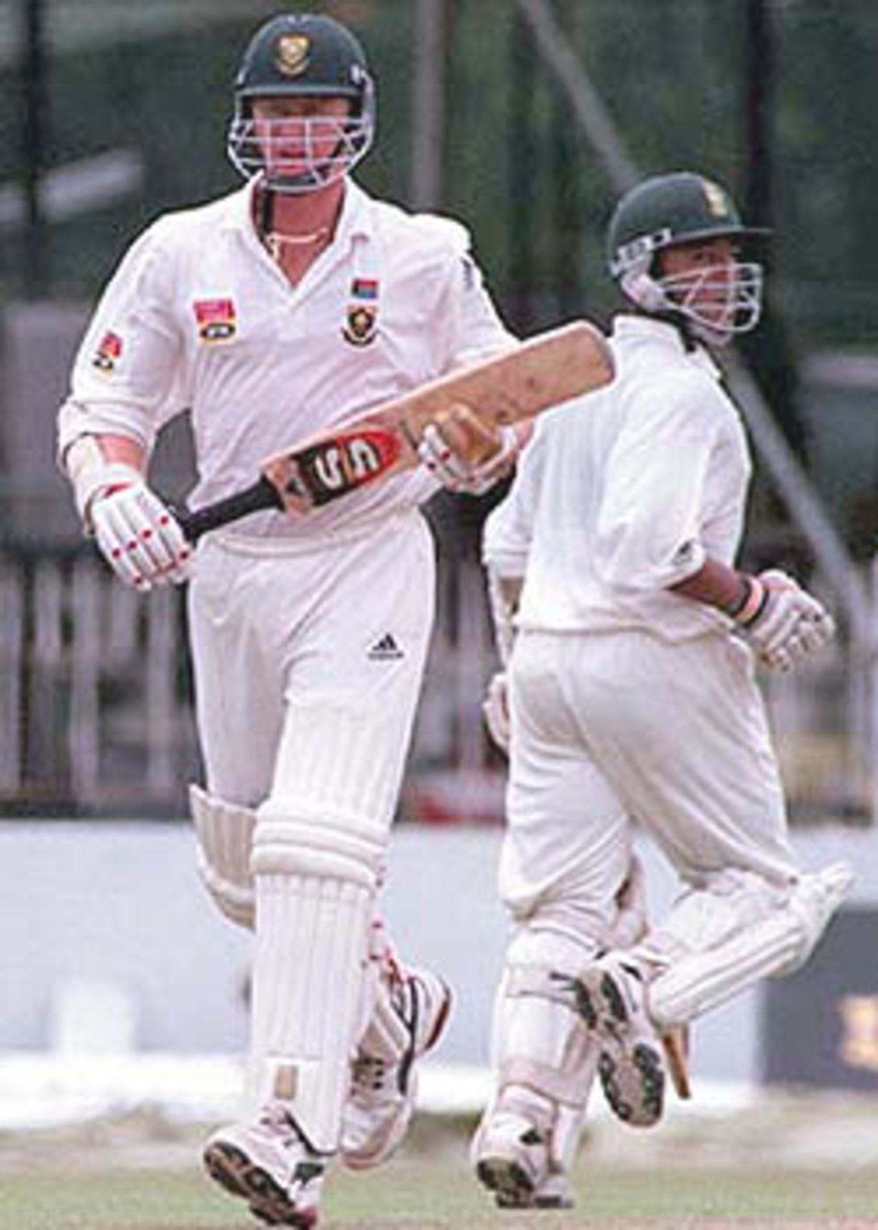 South Africa's top scorer Lance Klusener takes a quick single while batting with Paul Adams, South Africa in Sri Lanka, 2000/01, 3rd Test, Sri Lanka v South Africa, Sinhalese Sports Club Ground, Colombo, 06-10 August 2000 (Day 2).