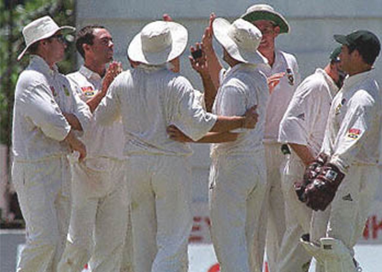 South African bowler Nicky Boje (second from left) celebrates the dismissal of Sri Lankan batsman Mahela Jayewardene with teammats during the third and final test against Sri Lanka, 08 August 2000. South Africa in Sri Lanka, 2000/01, 3rd Test, Sri Lanka v South Africa, Sinhalese Sports Club Ground, Colombo, 06-10 August 2000 (Day 3).