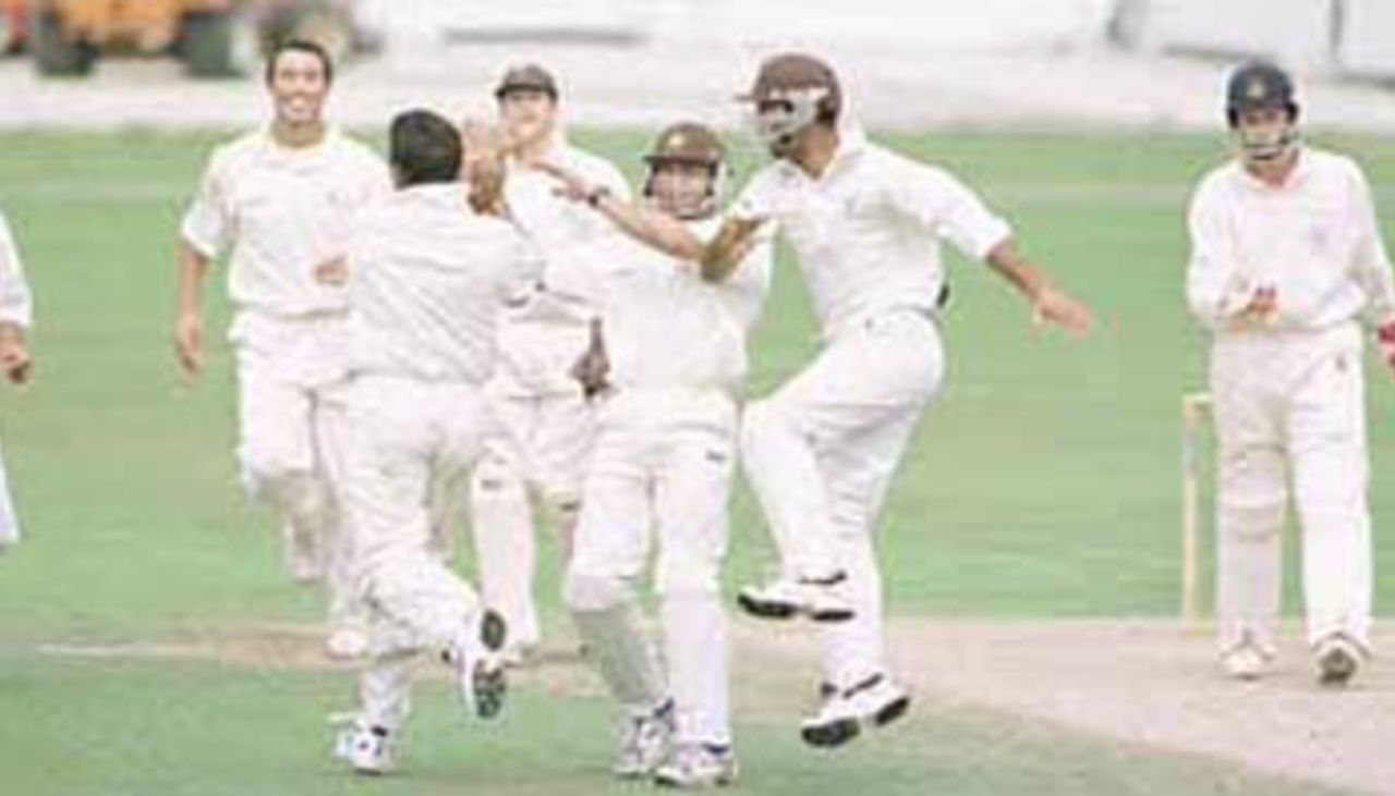 The Surrey team is delighted as John Crawley departs, PPP healthcare County Championship Division One, 2000, Surrey v Lancashire, Kennington Oval, London, 02-05 August 2000(Day 4).