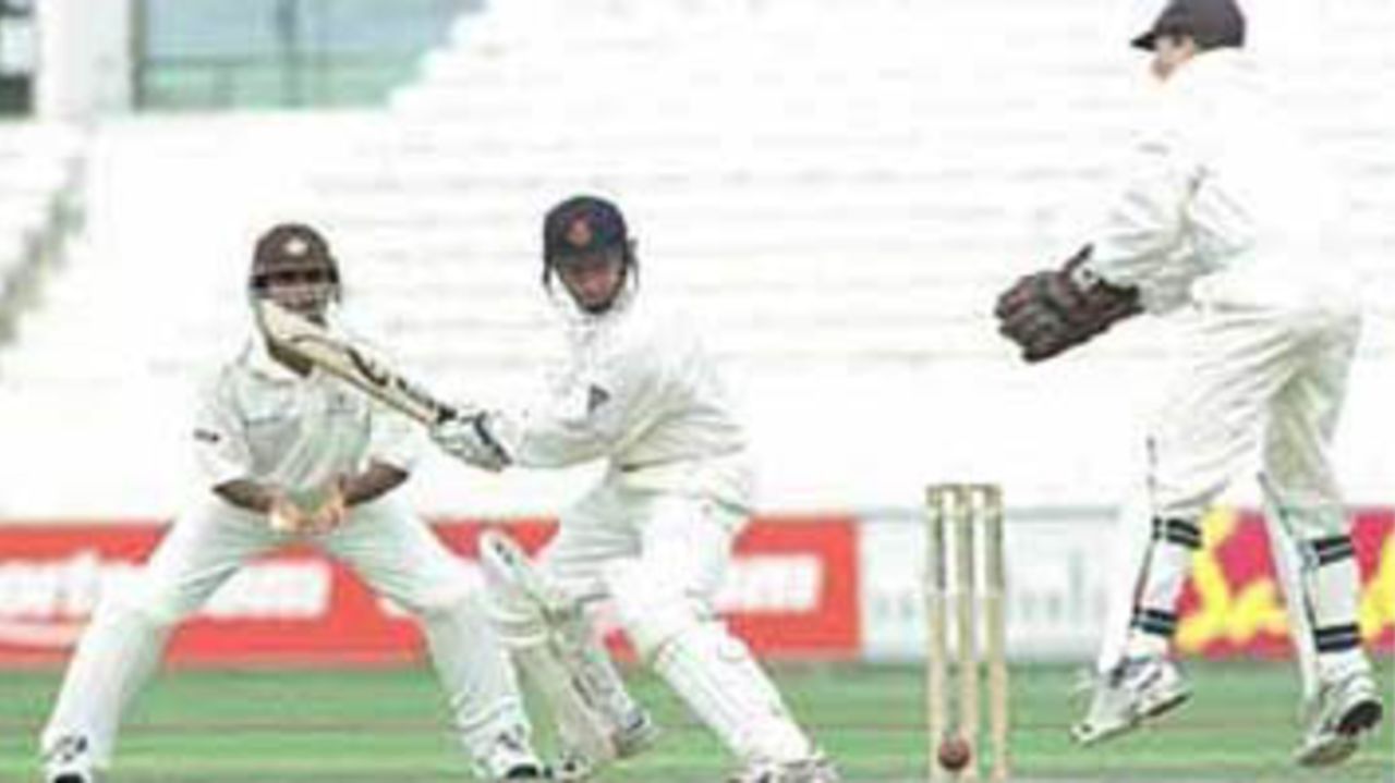 Fairbrother cuts the ball as the wicket keeper and short leg watch, PPP healthcare County Championship Division One, 2000, Surrey v Lancashire, Kennington Oval, London, 02-05 August 2000(Day 4).