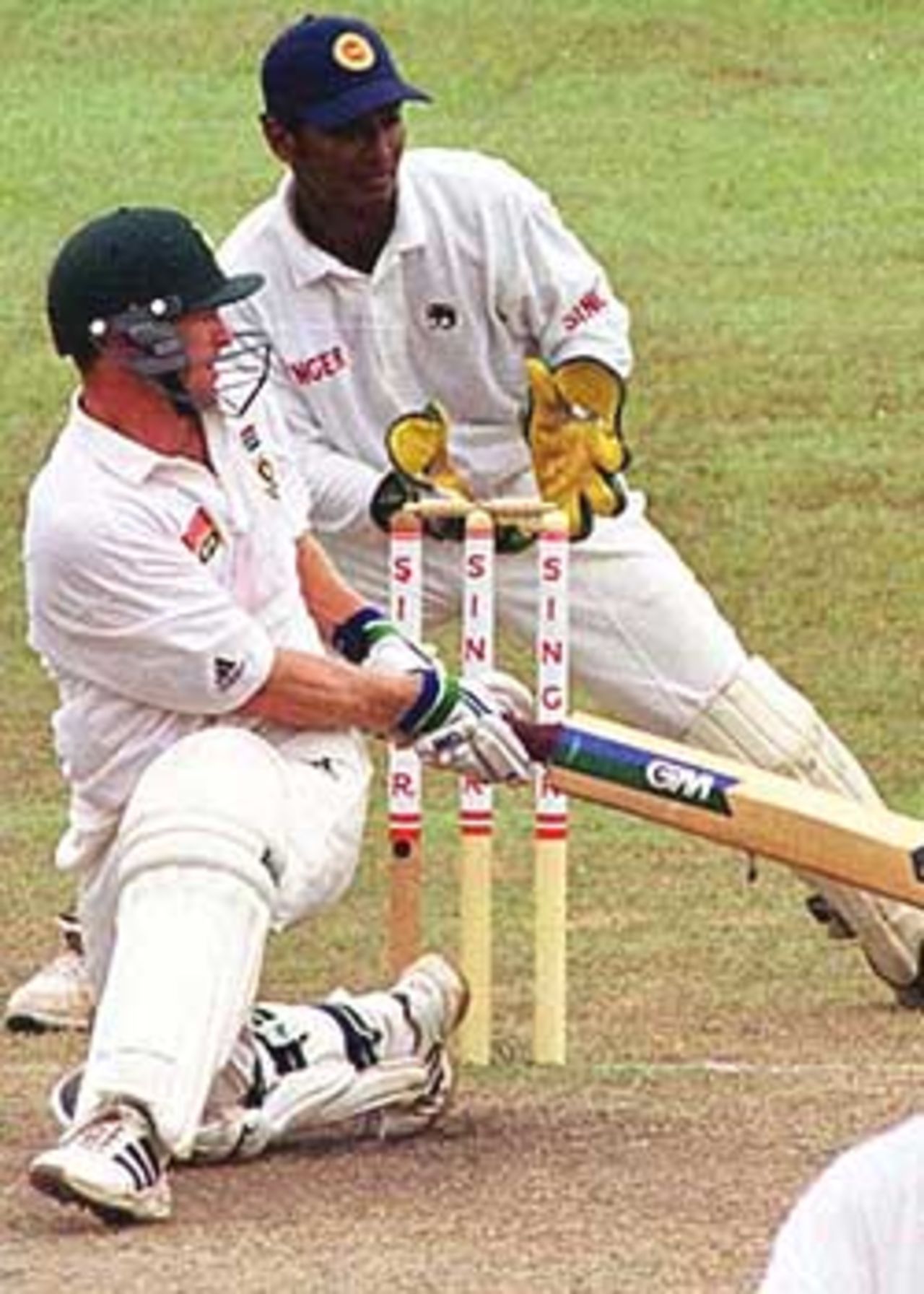 Rhodes executes the sweep to good effect, South Africa in Sri Lanka, 2000/01, 3rd Test, Sri Lanka v South Africa, Sinhalese Sports Club Ground, Colombo, 06-10 August 2000 (Day 4).
