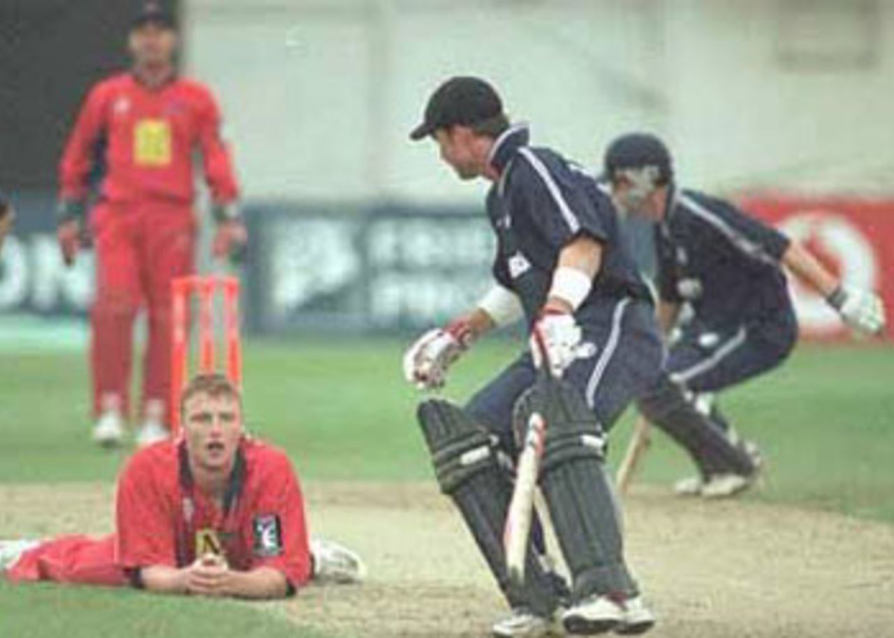 Flintoff sprawled on the ground while trying to field the ball, National League Division One, 2000, Sussex v Lancashire, New County Ground, Hove, Brighton, 07 August 2000.