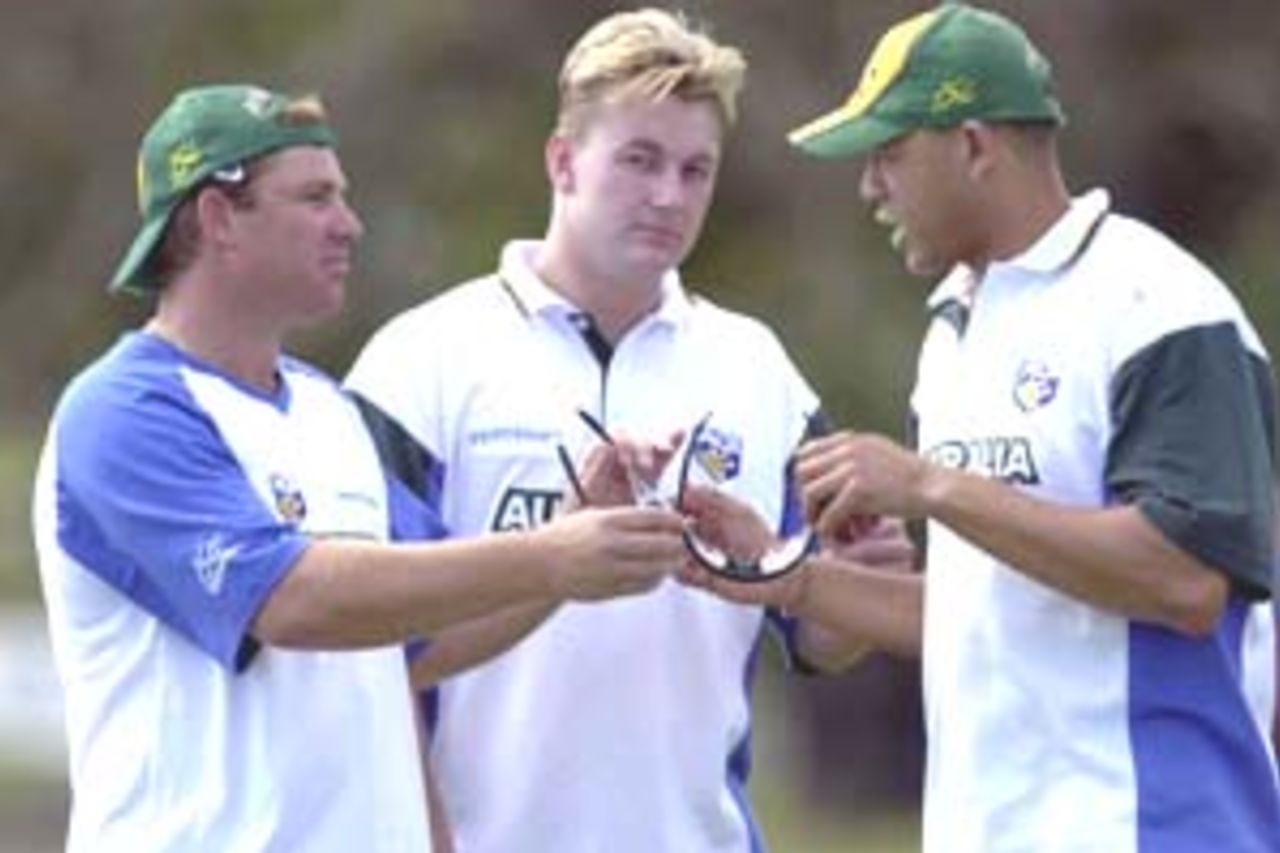 10 Aug 2000: Shane Warne, Shane Lee and Andrew Symonds of Australia swap sun-glasses during training for the Australian Cricket team at Allan Border Field in Brisbane, Australia. The Australian team are preparing for Super Challenge 2000 against South Africa.